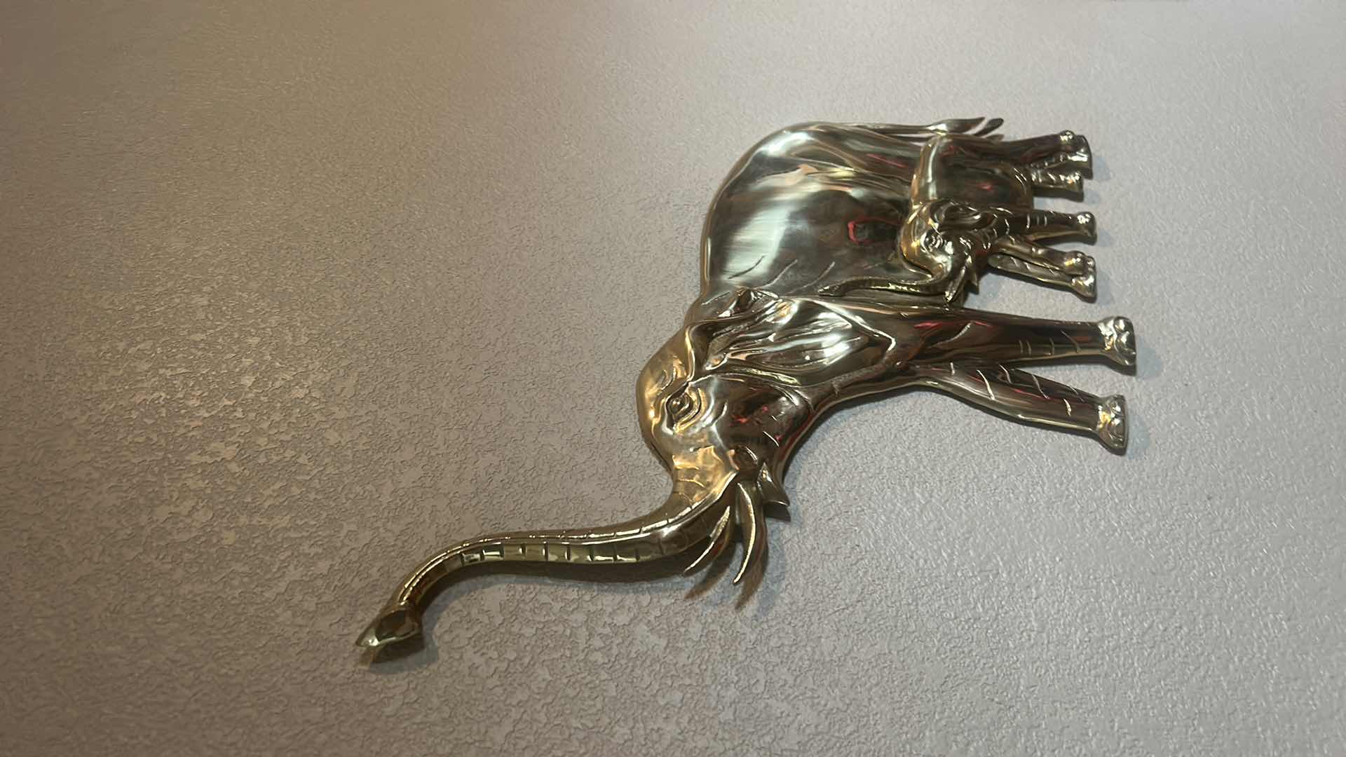 Photo 1 of BRASS ELEPHANT WITH BABY WALL DECOR 23“ x H17“