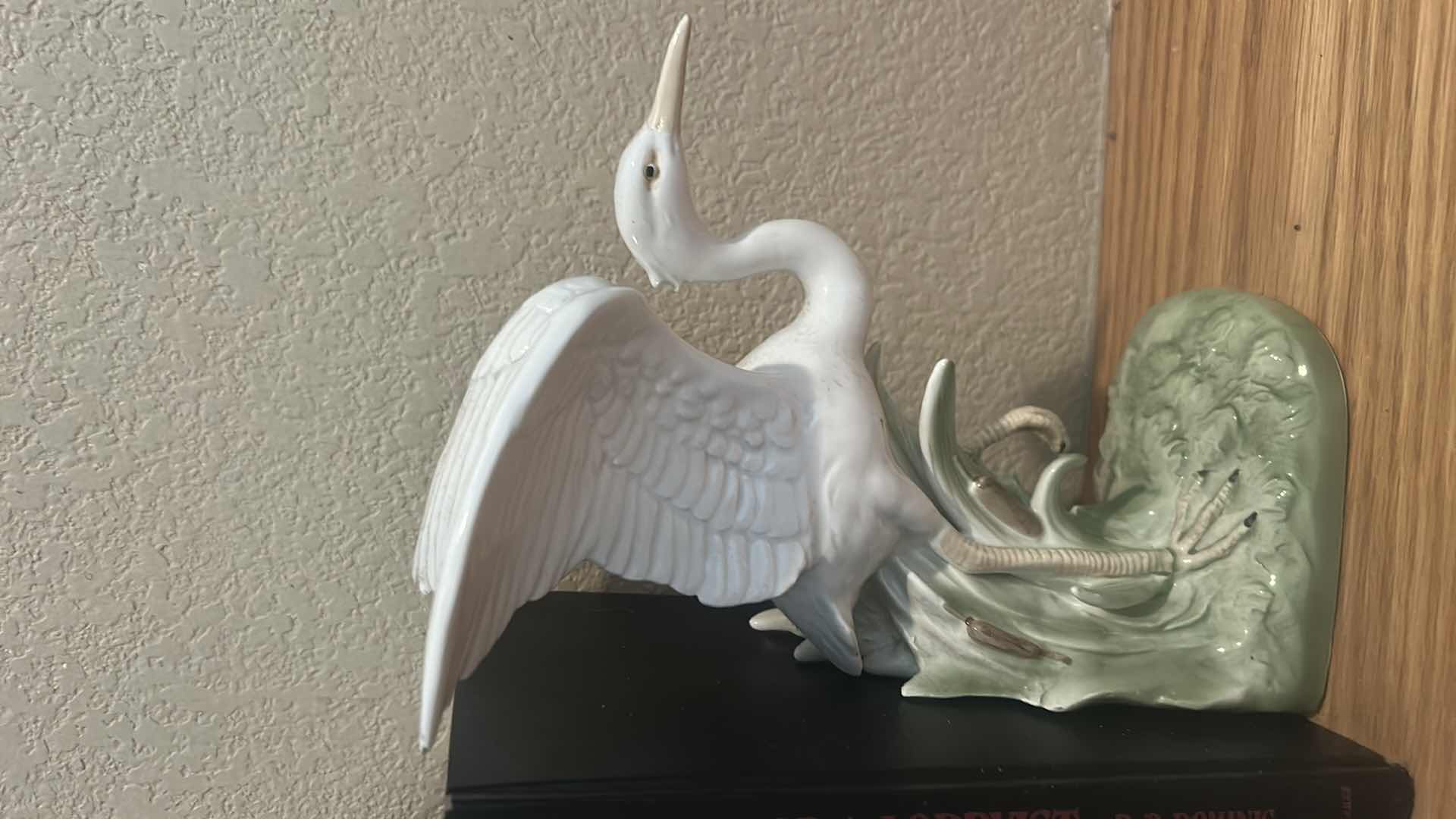 Photo 1 of PORCELAIN CRANE BOOKENDS AND BOOKS
