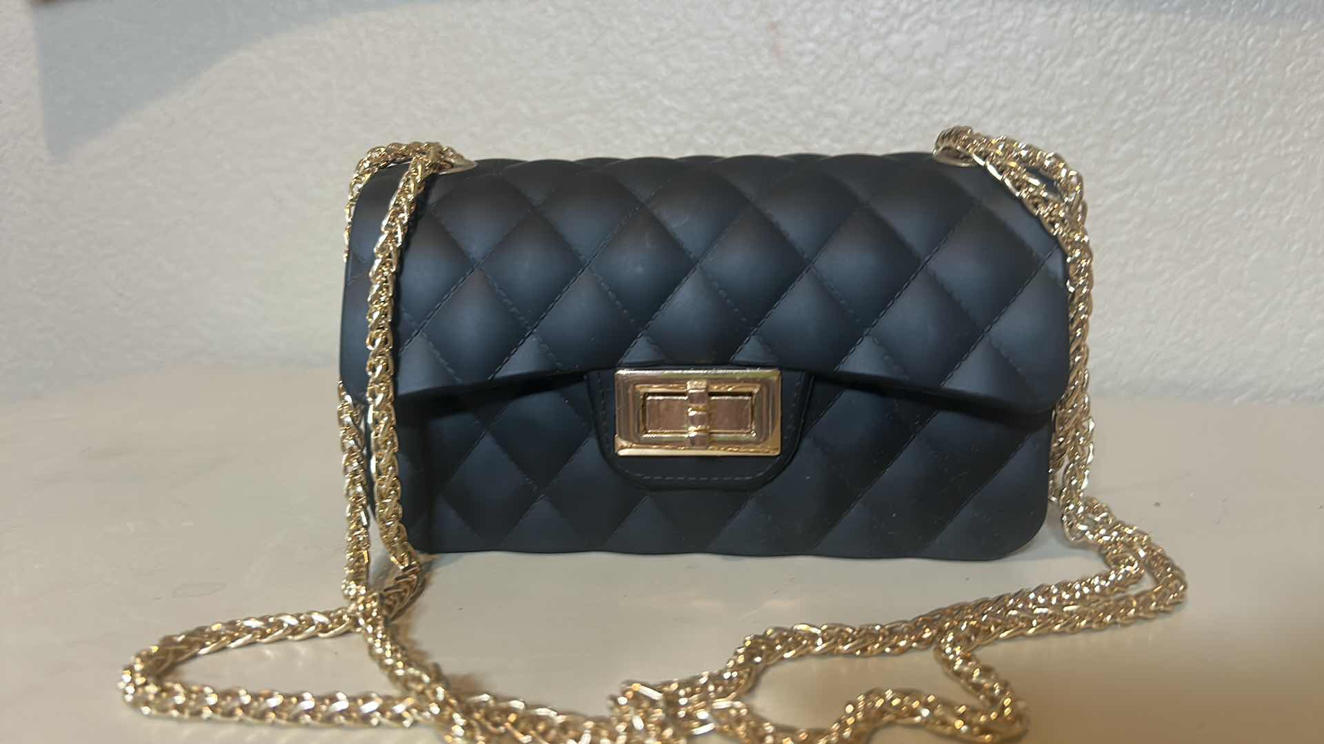 Photo 1 of SMALL BLACK HANDBAG WITH GOLD CHAIN 7” x 4 1/4”