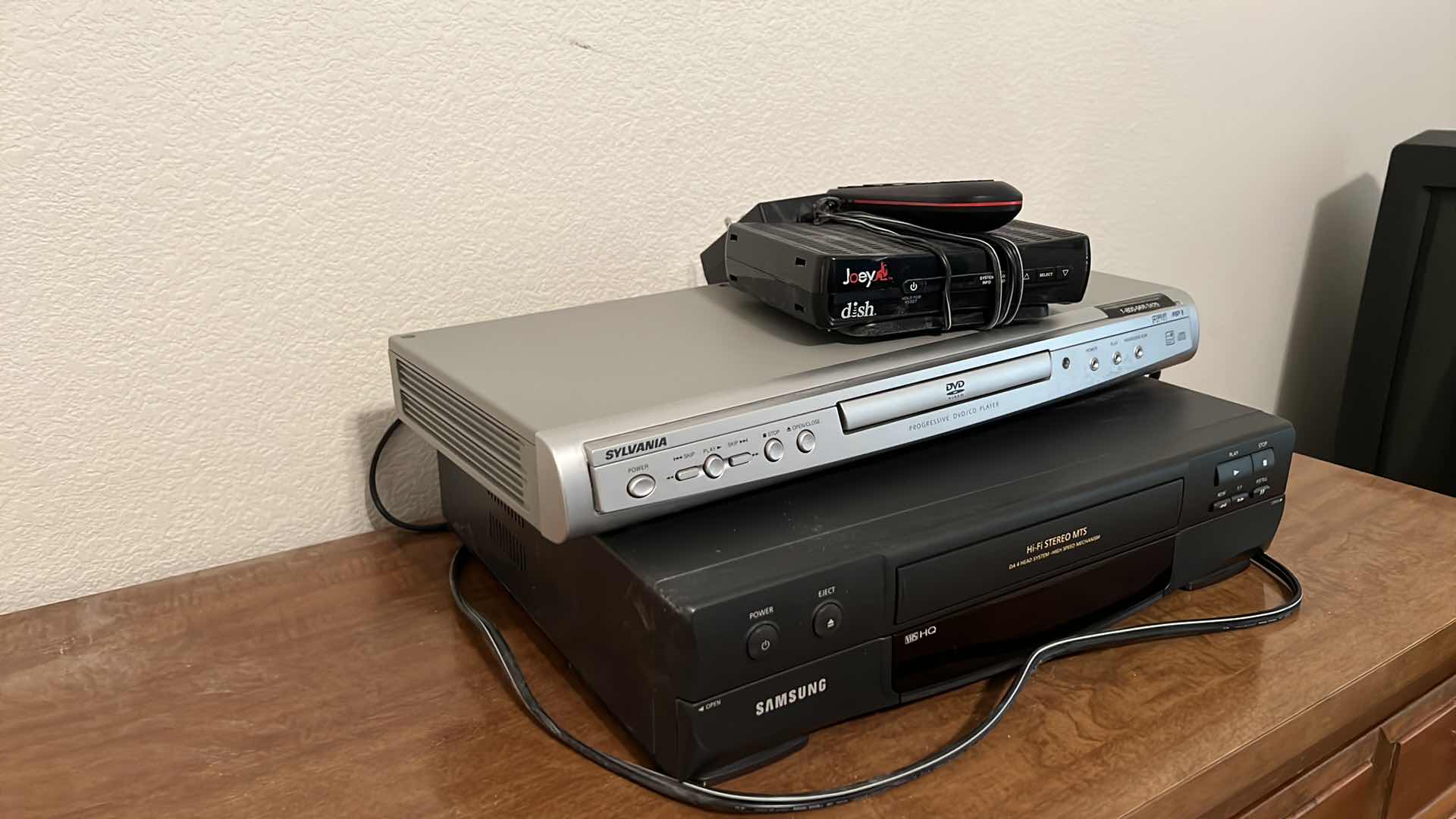 Photo 3 of HOME ELECTRONICS (SAMSUNG VHS PLAYER, SYLVANIA DVD PLAYER & DISH BOX W REMOTE)