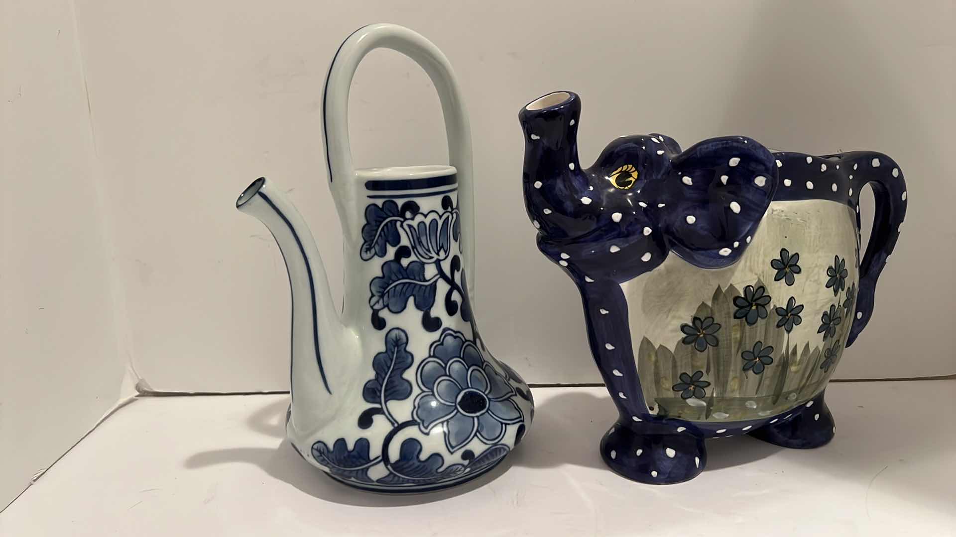 Photo 1 of 2-BLUE & WHITE CERAMIC PITCHERS H10”