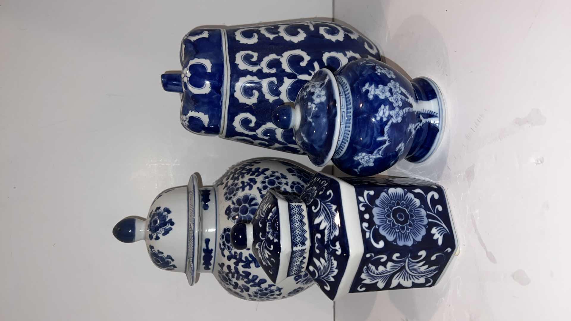 Photo 1 of 4-BLUE & WHITE LIDDED JARS (TALLEST HEIGHT 12”)