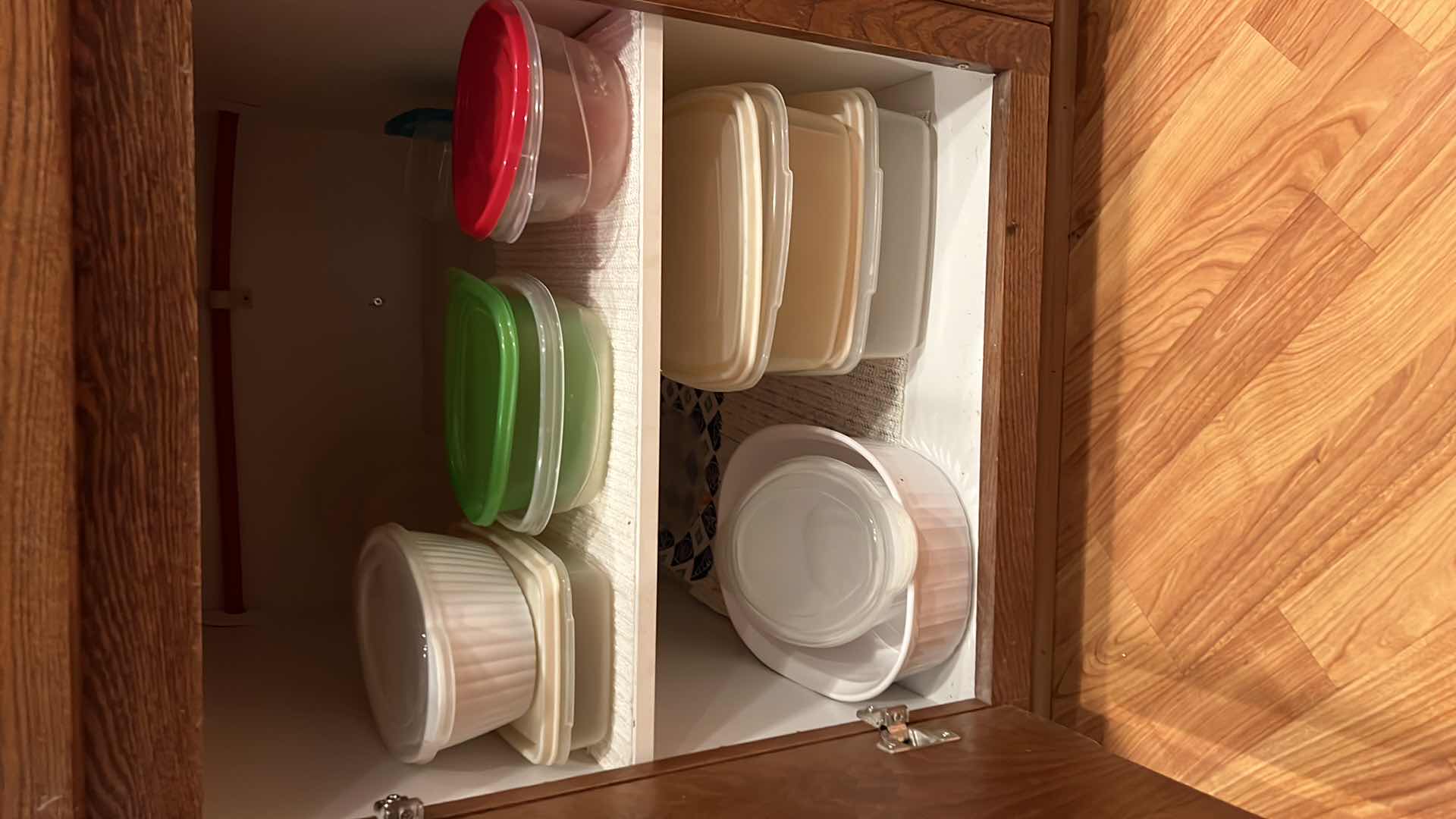 Photo 1 of CONTENTS OF KITCHEN CABINET-PLASTIC STORAGE CONTAINERS