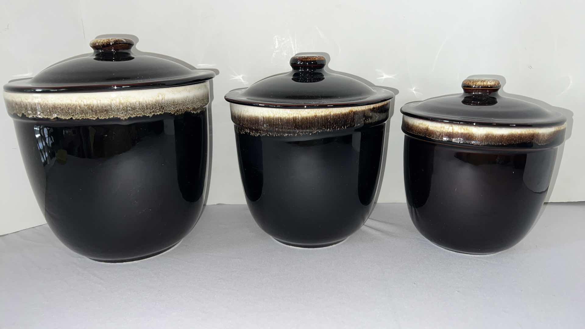 Photo 1 of SET OF 3-VINTAGE PFALTZGRAFF GOURMET BROWN DRIP GLAZE CANISTER SET W LIDS (7", 6" 5" ROUND)