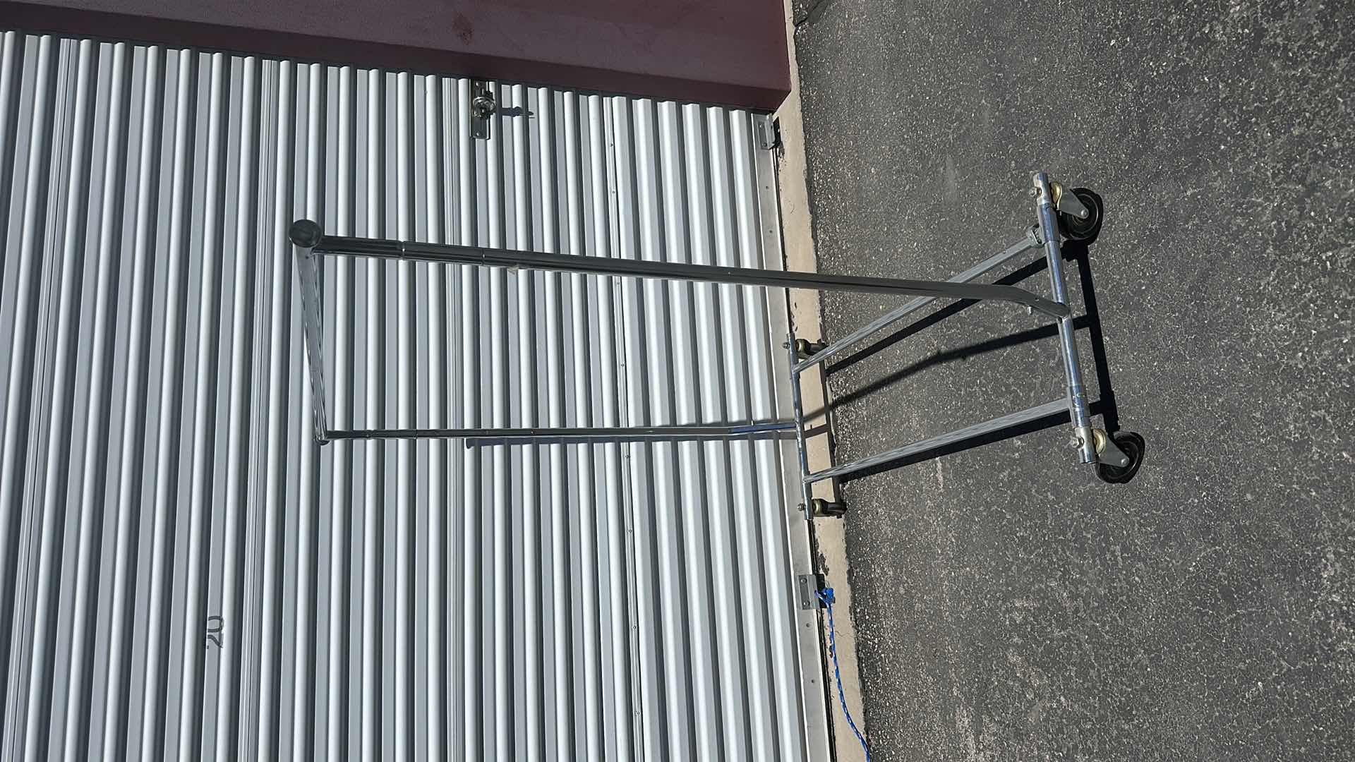 Photo 2 of ADJUSTABLE METAL ROLLING CLOTHES RACK