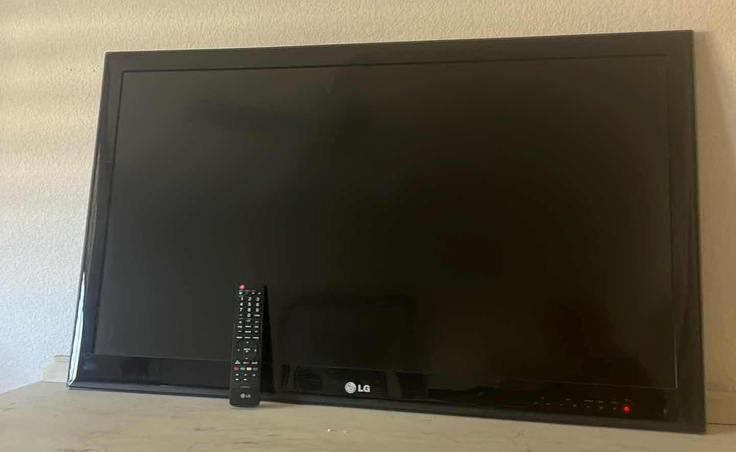 Photo 1 of LG 42" HDMI FLAT SCREEN TV W REMOTE (NO STAND)