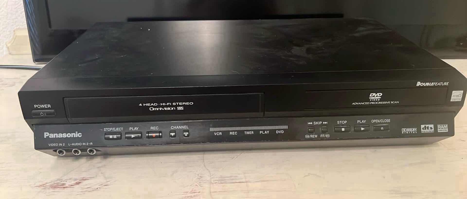 Photo 1 of PANASONIC OMNIVISION VHS/ DVD PLAYER W REMOTE