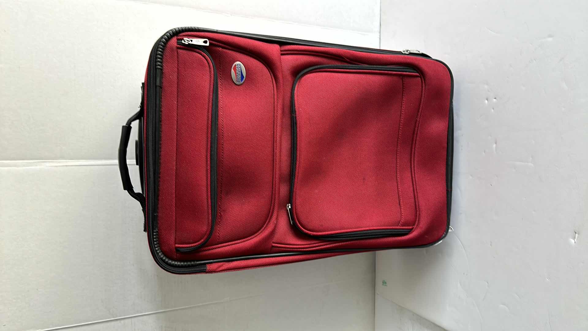 Photo 1 of AMERICAN TOURISTER OVER NIGHT BAG