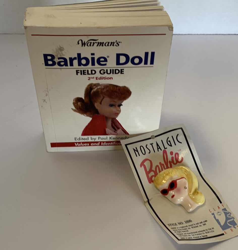 Photo 1 of BARBIE FIELD GUIDE AND VINTAGE 1989 NOSTALGIC BARBIE CERAMIC PIN.