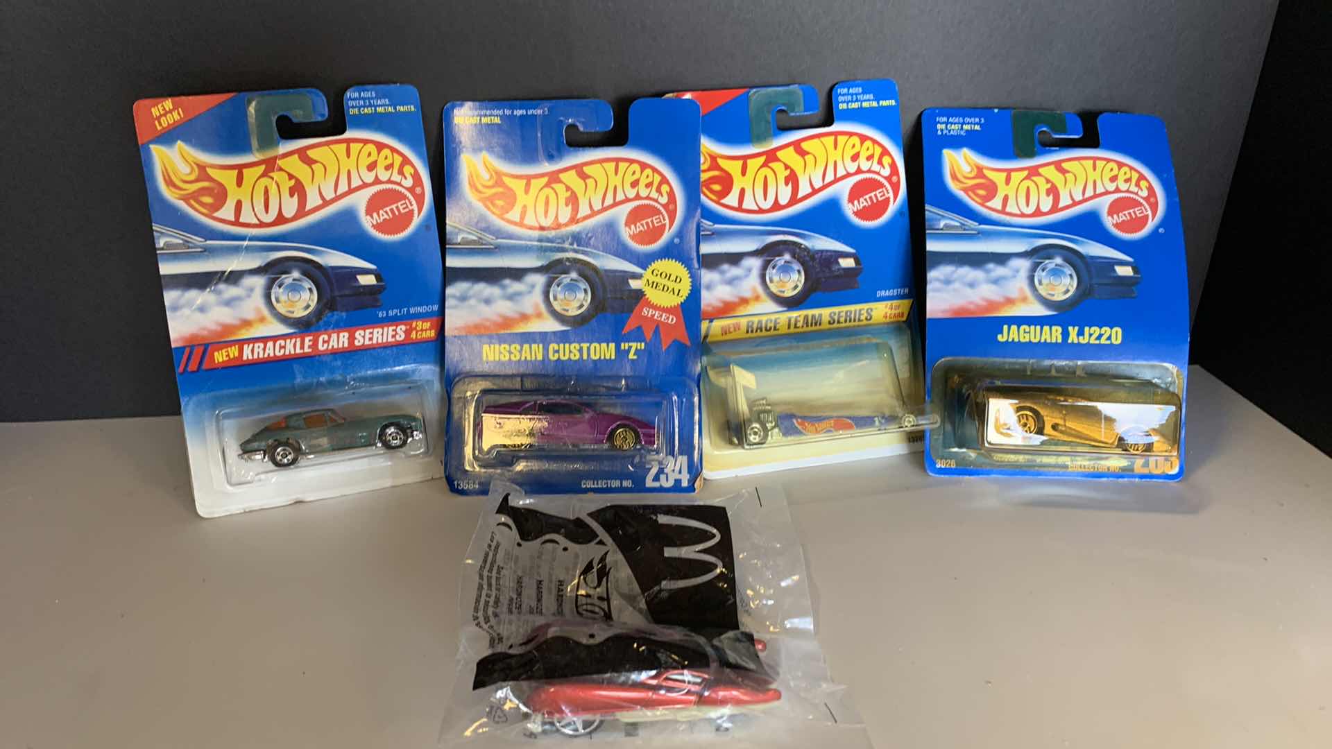 Photo 1 of 4-NEW HOT WHEELS BLISTER PACKS & MCDONALDS HAPPY MEAL TOY