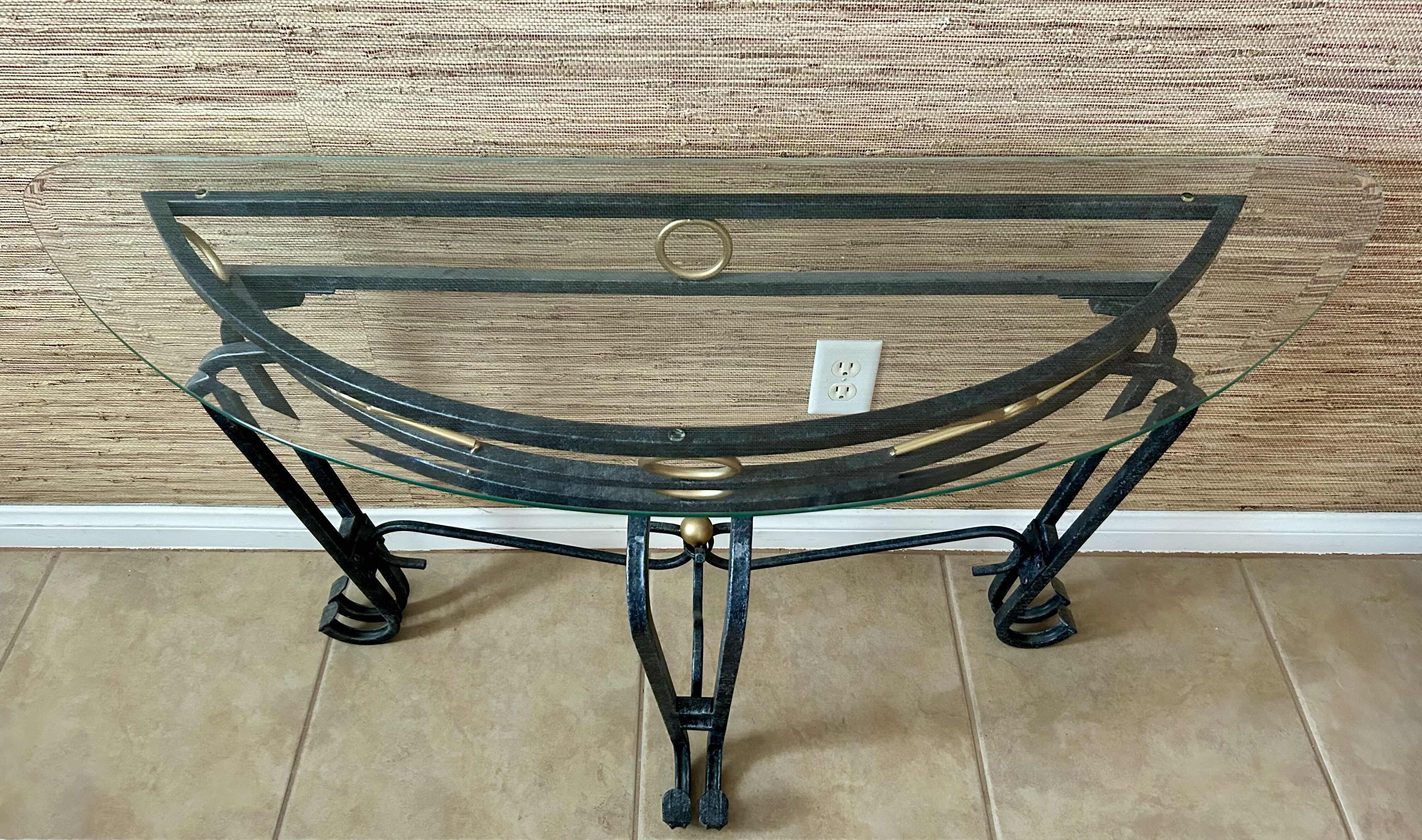 Photo 2 of CONSOLE TABLE BLACK METAL W GLASS TOP & GOLD ACCENTS 17” X 48” H26”
