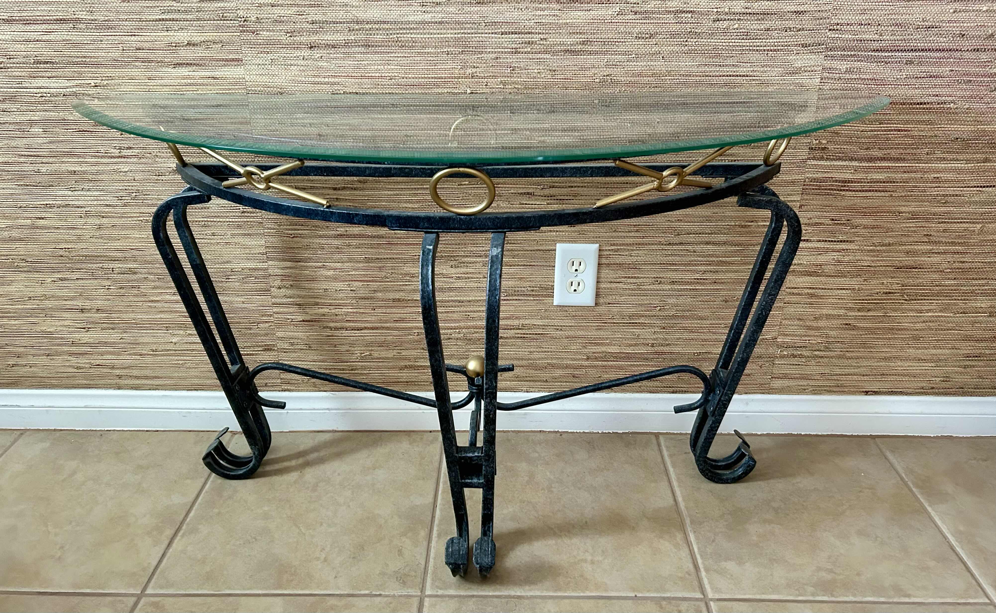 Photo 1 of CONSOLE TABLE BLACK METAL W GLASS TOP & GOLD ACCENTS 17” X 48” H26”
