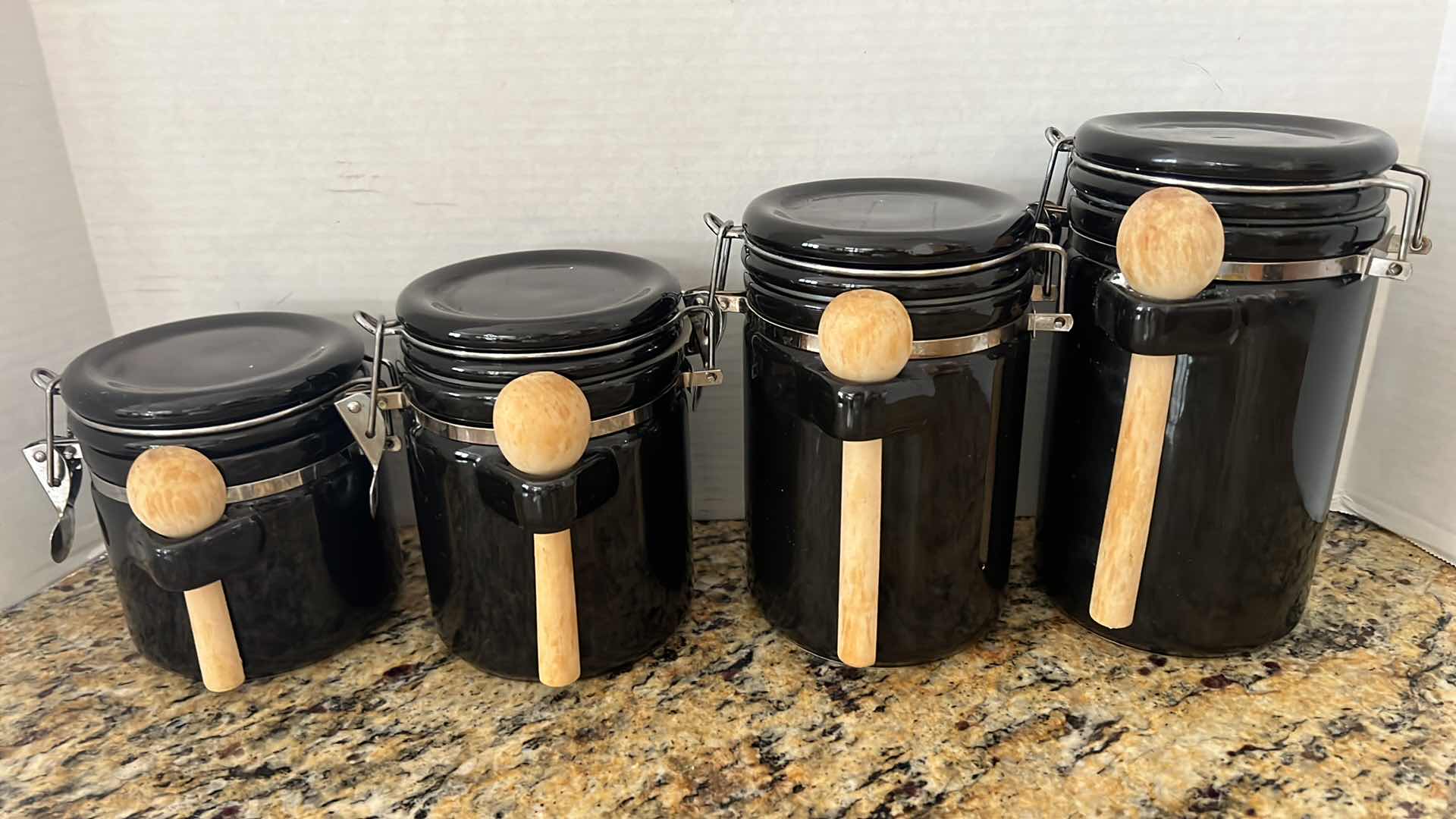 Photo 1 of 4-NAVY BLUE CERAMIC CANISTER SET W WOODEN SPOONS