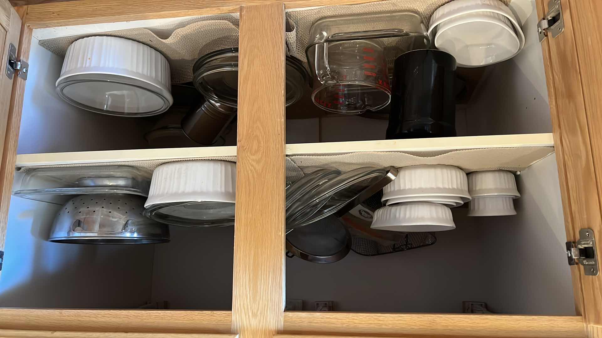 Photo 1 of CONTENTS OF KITCHEN CABINET- BAKEWARE