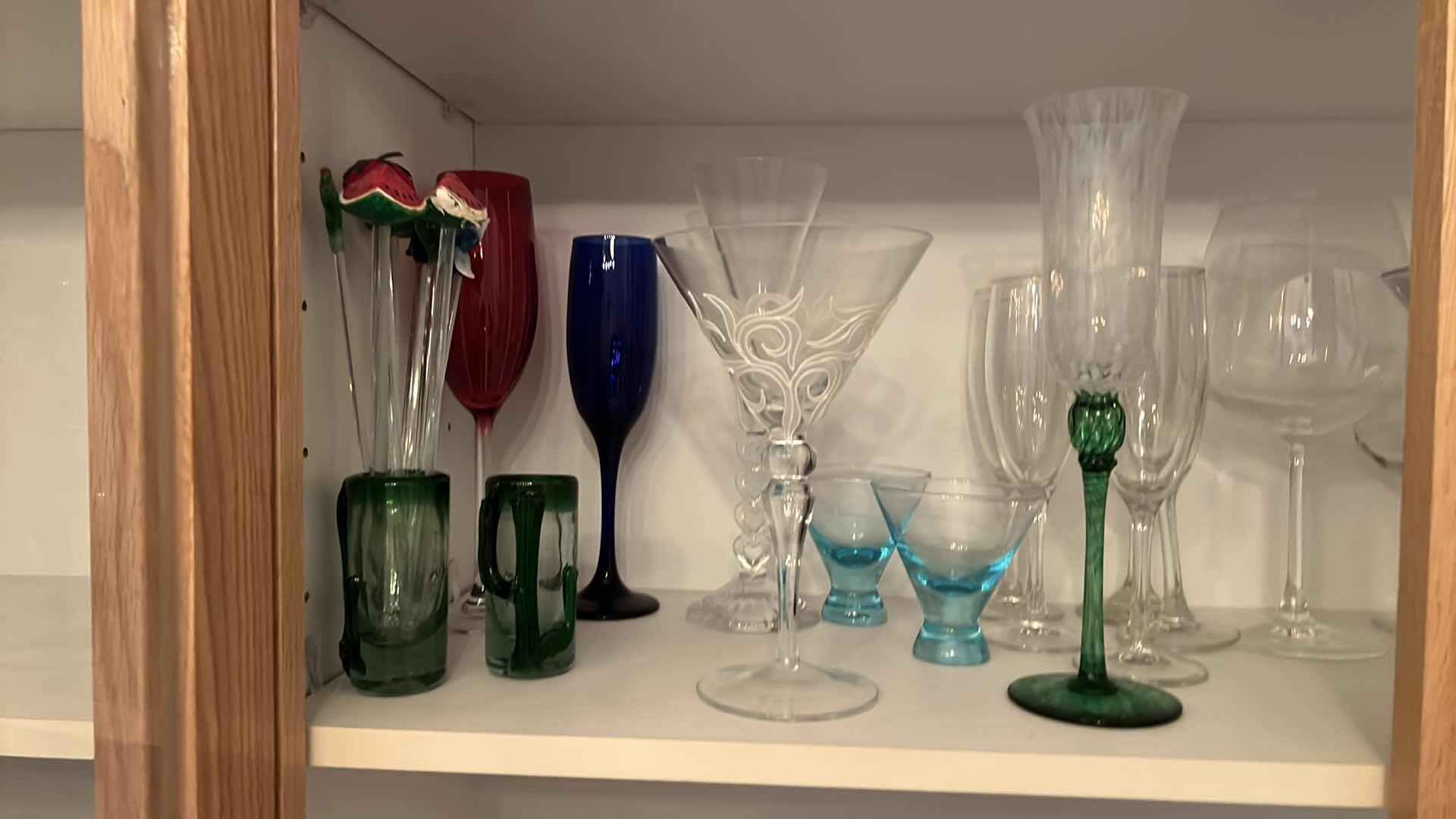 Photo 2 of CONTENTS OF 2 BAR CABINET SHELVES- BAR GLASSES