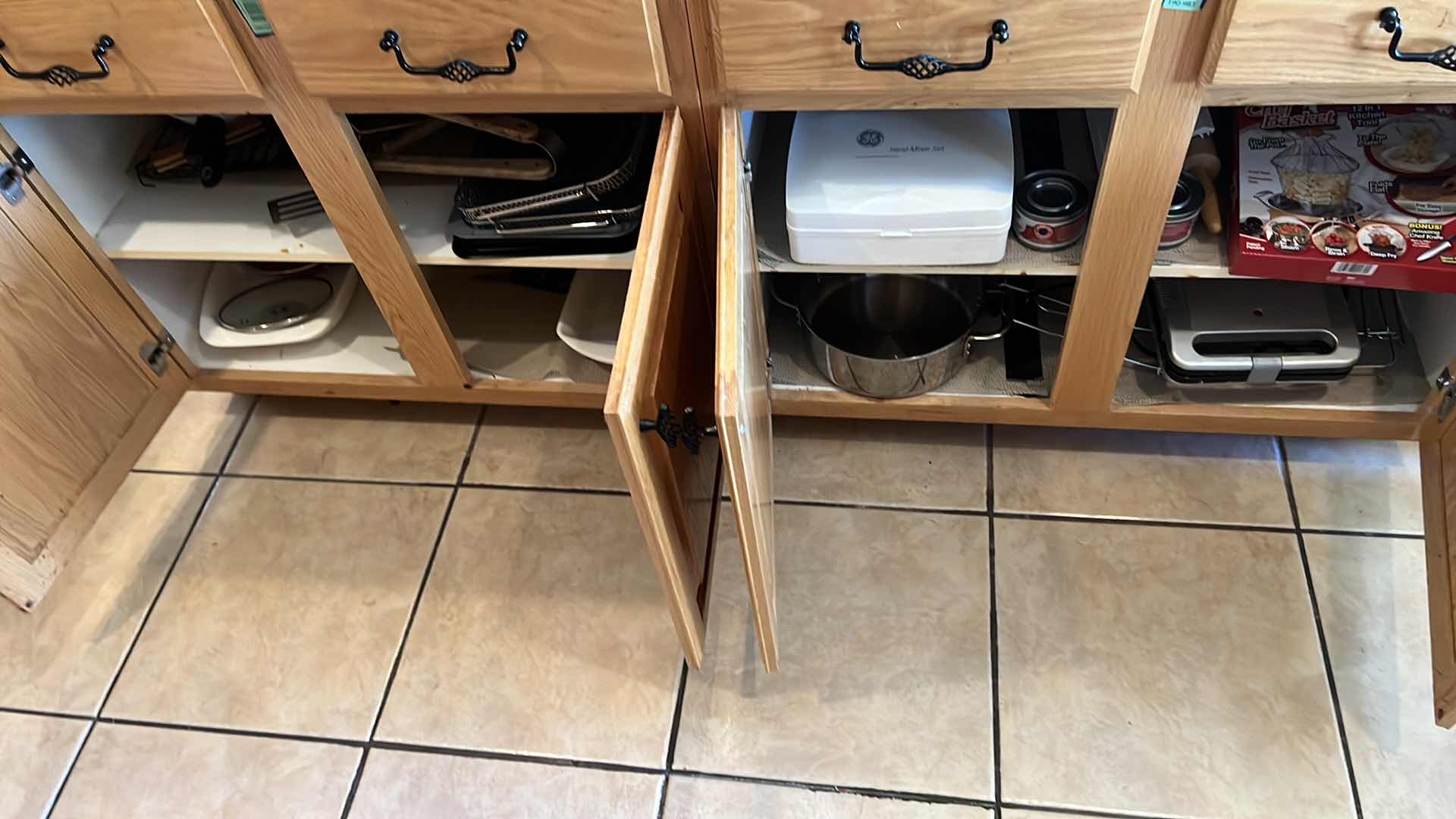 Photo 1 of CONTENTS OF KITCHEN CABINETS-WAFFLE IRON, HAND MIXER, KICHEN ESSENTIALS