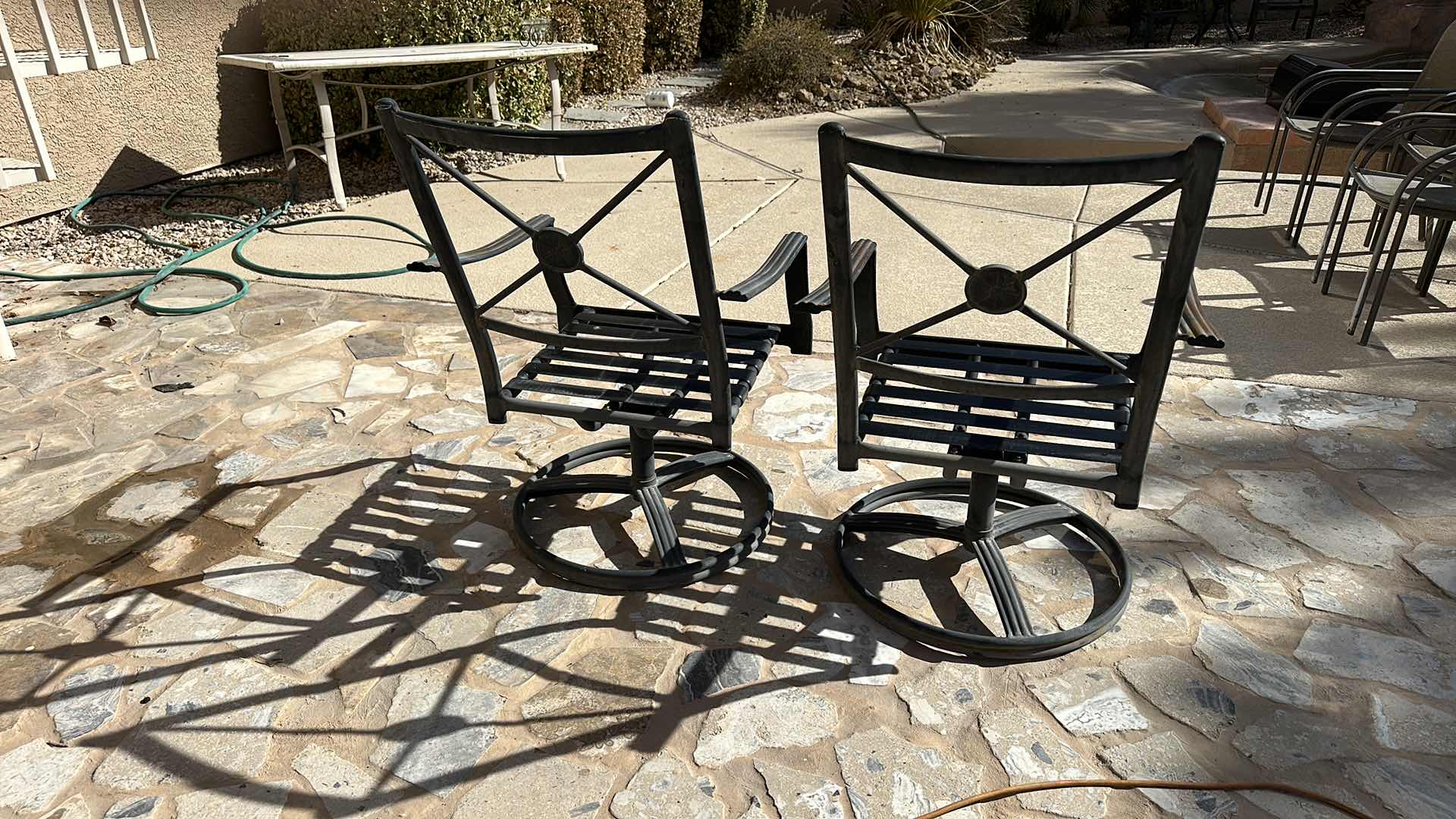 Photo 4 of 4' ROUND BLACK METAL PATIO TABLE W 2 SWIVEL ARM CHAIRS