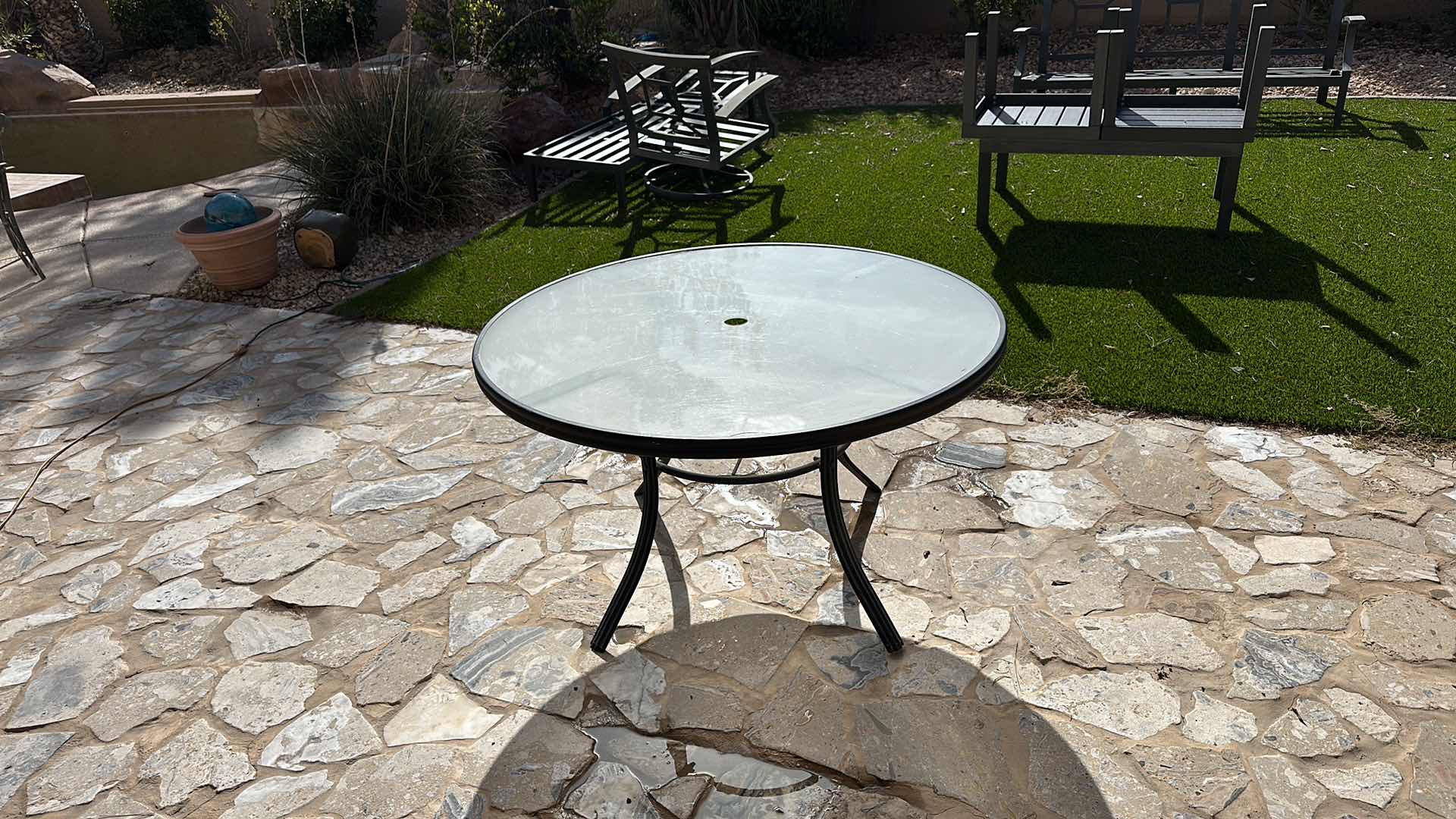 Photo 2 of 4' ROUND BLACK METAL PATIO TABLE W 2 SWIVEL ARM CHAIRS