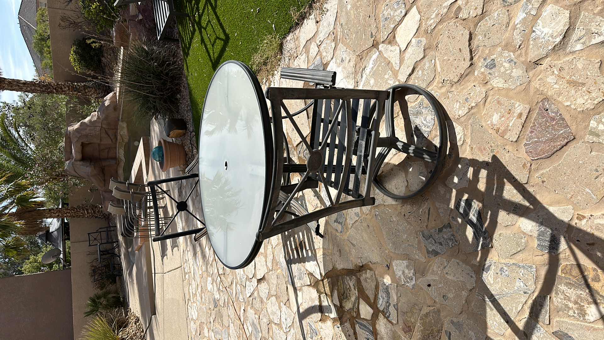 Photo 1 of 4' ROUND BLACK METAL PATIO TABLE W 2 SWIVEL ARM CHAIRS