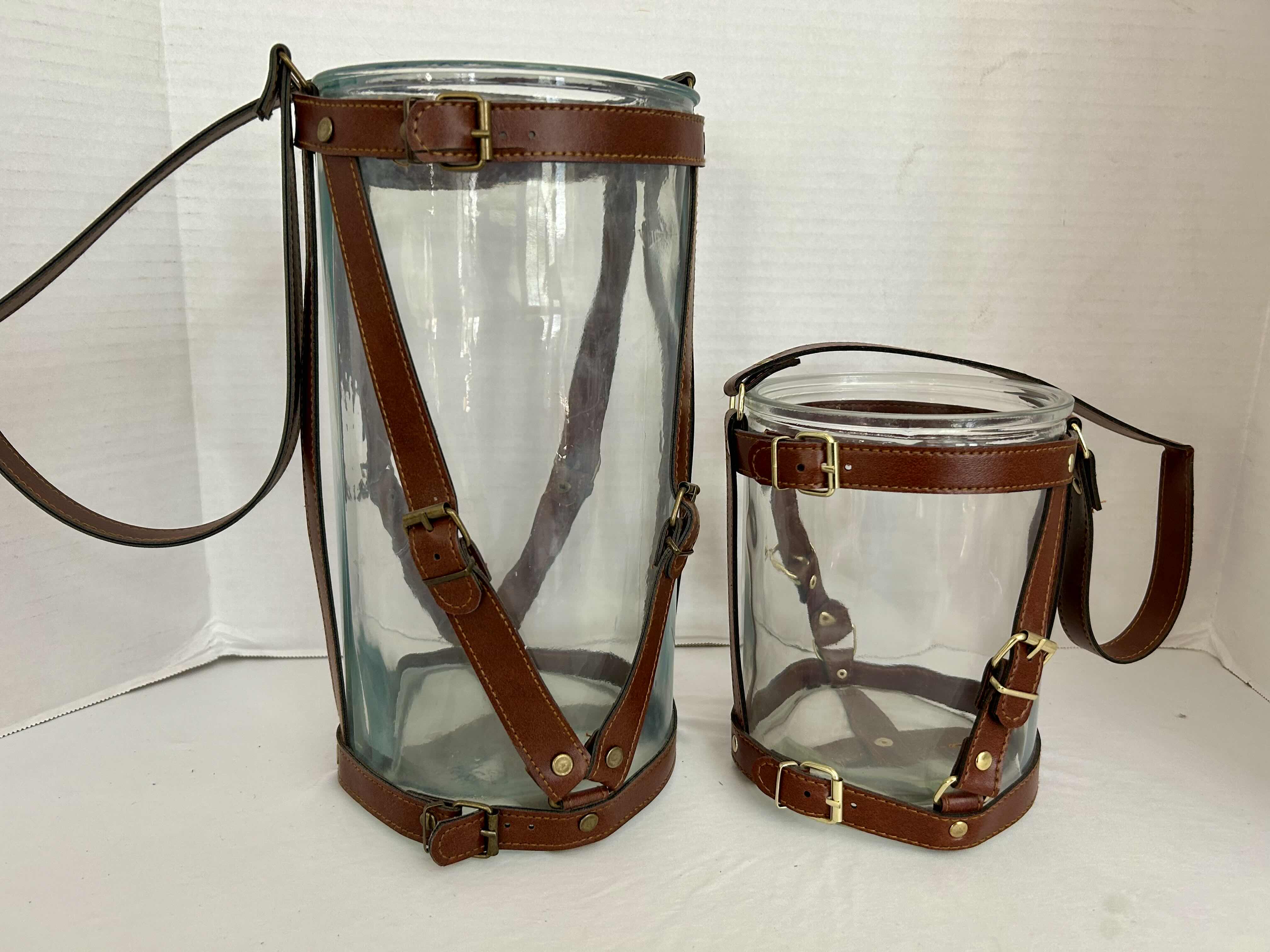 Photo 1 of 2 HANGING LEATHER WRAPPED HURRICANE THICK GLASS CANDLE HOLDERS H12” and H7”