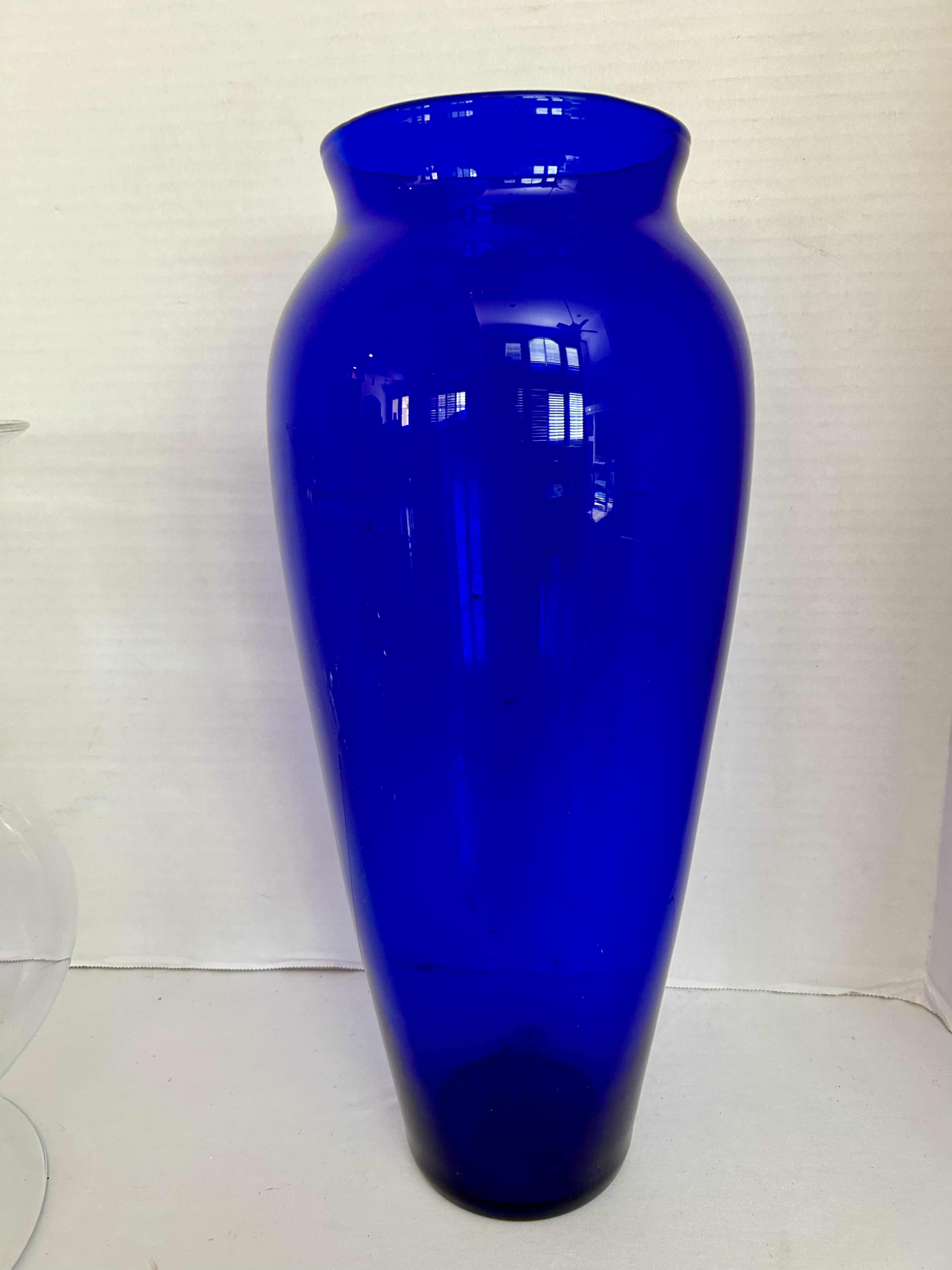 Photo 2 of 2 LARGE GLASS VASES IN CLEAR H12” AND BLUE H16”