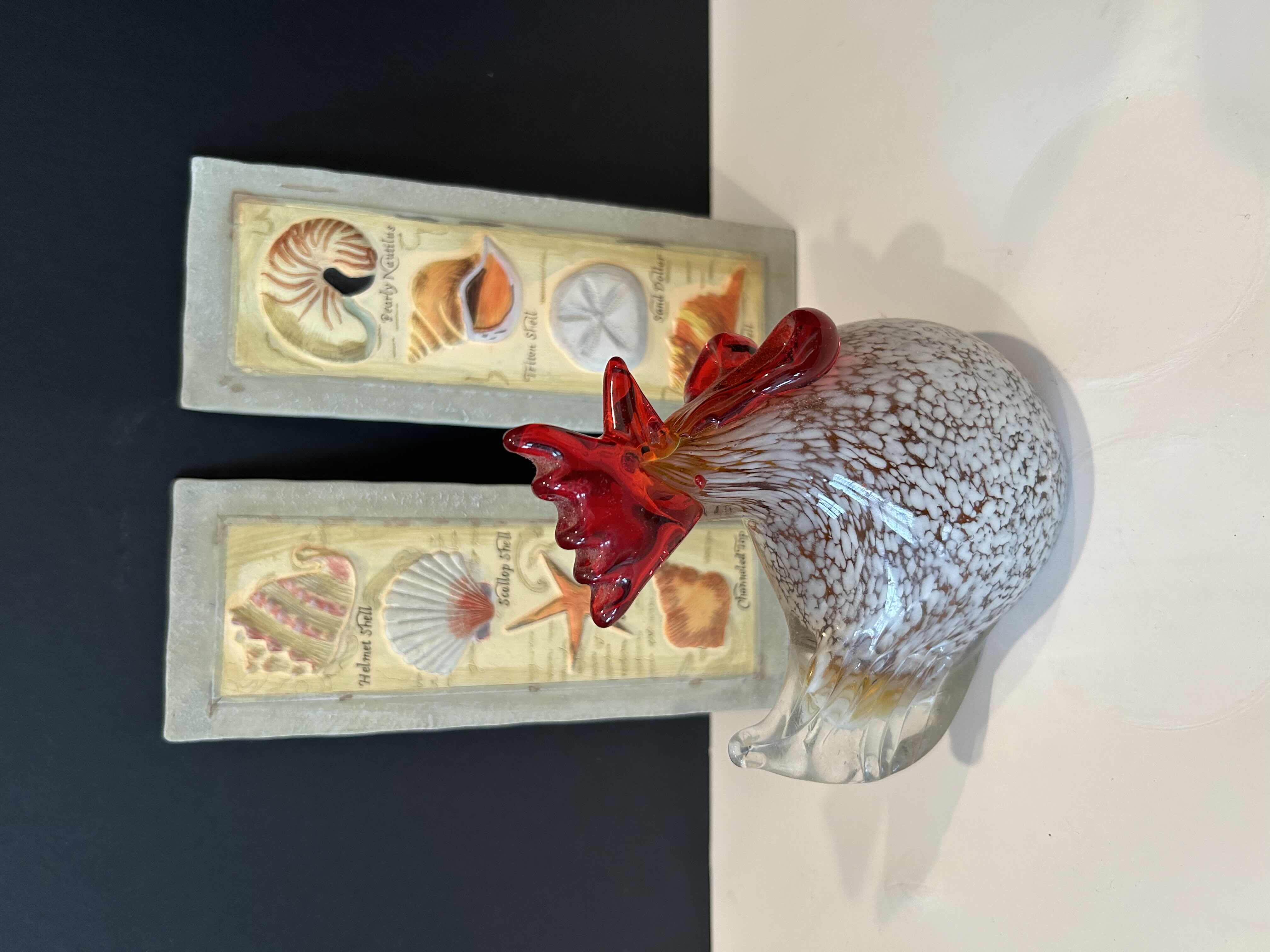 Photo 1 of BLOWN GLASS ROOSTER PAPERWEIGHT and 2 H8” SHELL WALL PLAQUES 
RETAIL:$40.00