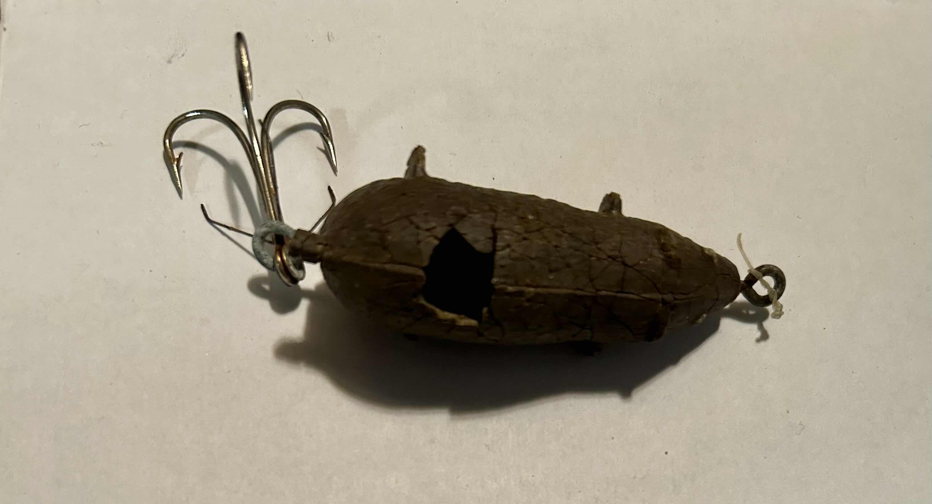 Photo 4 of VINTAGE FIRST AID BOX (EMPTY) AND 3 LURES 

1. RARE VINTAGE BERRY LEBECK MFG. CO. OZARK YELLOW TALKY TOPPER FISHING LURE
2. VINTAGE CREEK CHUB PIKIE FISHING LURE SURFSTER 
3. VINTAGE P & K SWIMMING MOUSE LURE

100.00