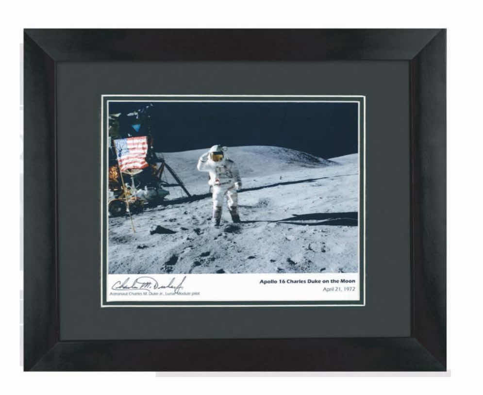 Photo 1 of APOLLO 16 FRAMED PHOTOGRAPH SIGNED BY ASTRONAUT CHARLIE DUKE WITH CERTIFICATE OF AUTHENTICITY IN BLACK FRAME 16” X 13” 

300.00