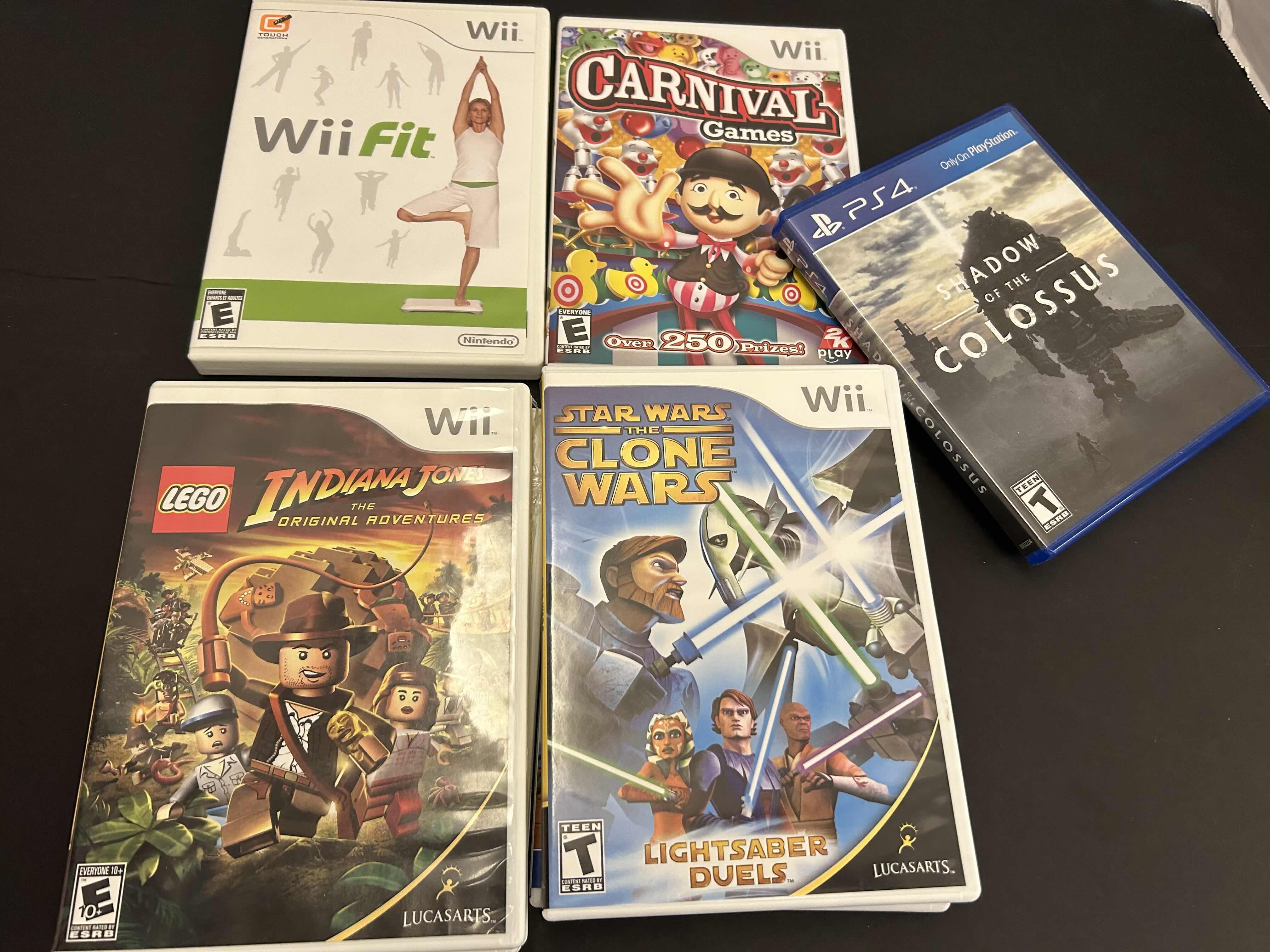 Photo 1 of 6-WII TITLES AND 1- PS4 GAME TITLE