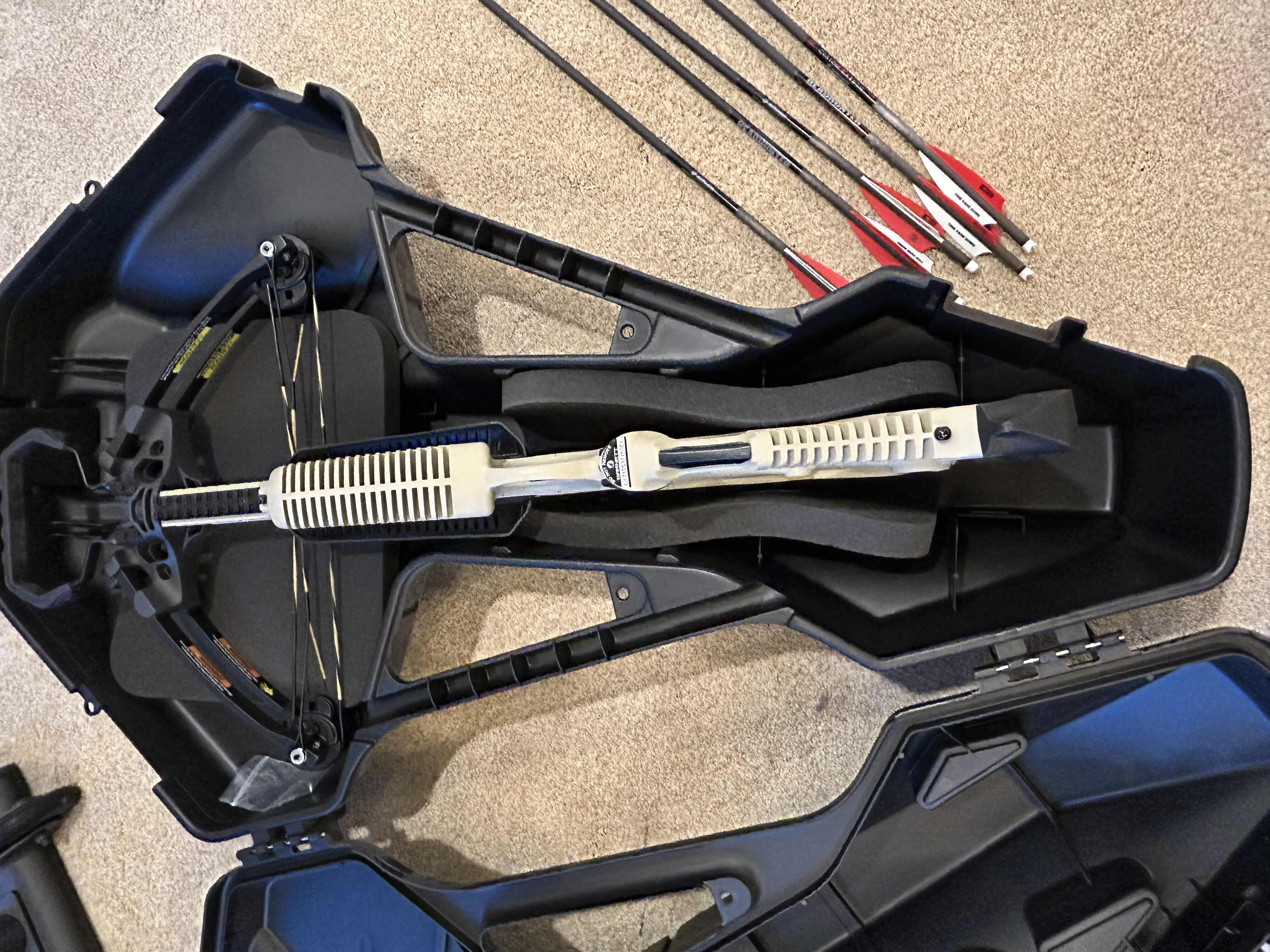 Photo 1 of BARNETT CROSSBOW IN HARD SHELL CASE 
INCLUDES 5 ARROWS (TIPS NOT INCLUDED)