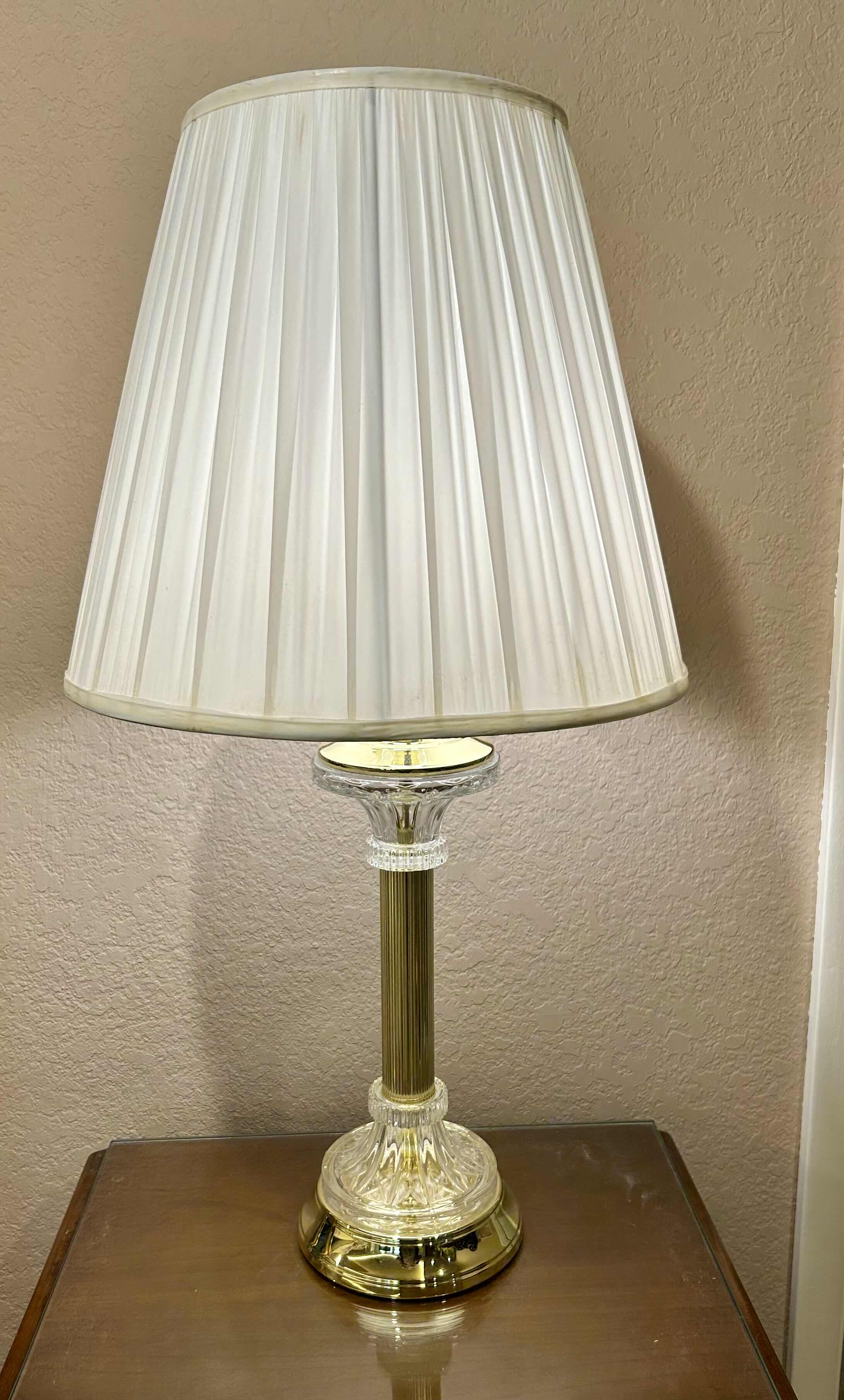 Photo 1 of BRASS AND GLASS TABLE TOP LAMP WITH WHITE PLEATED SHADE, H 30”