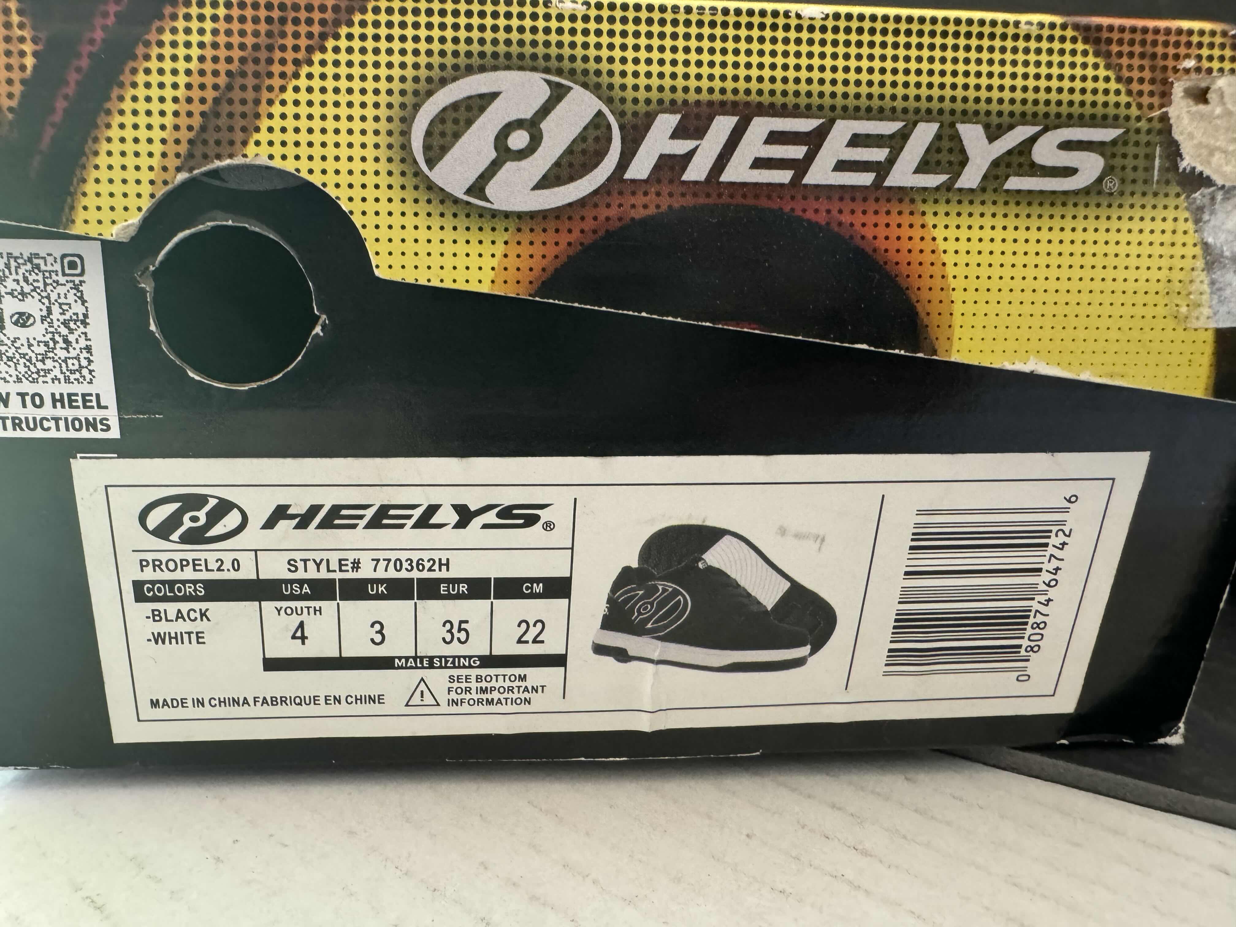 Photo 2 of BRAND NEW HEELYS YOUTH SIZE 4 (WHEELS NOT INCLUDED)