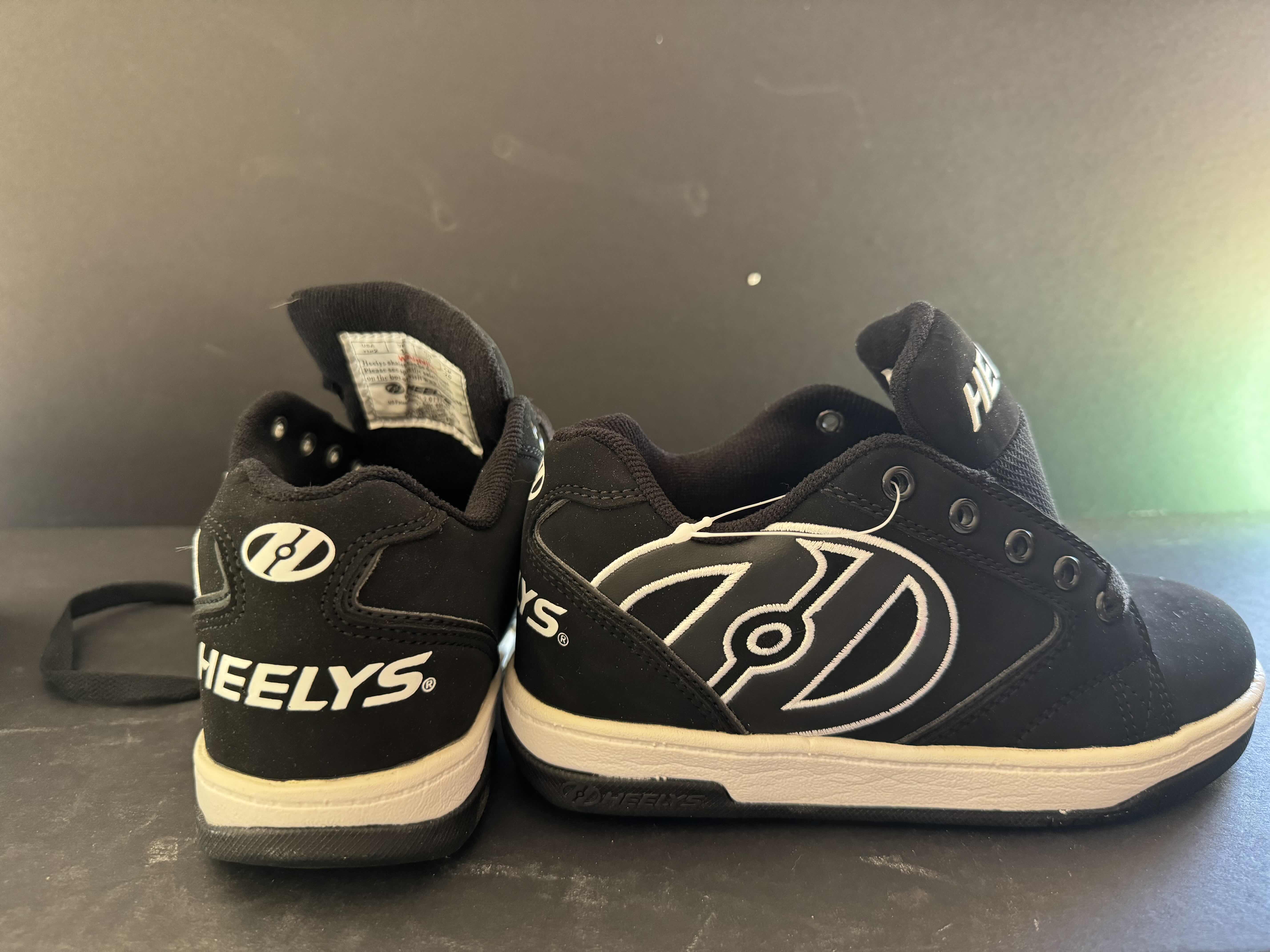 Photo 1 of BRAND NEW HEELYS YOUTH SIZE 4 (WHEELS NOT INCLUDED)