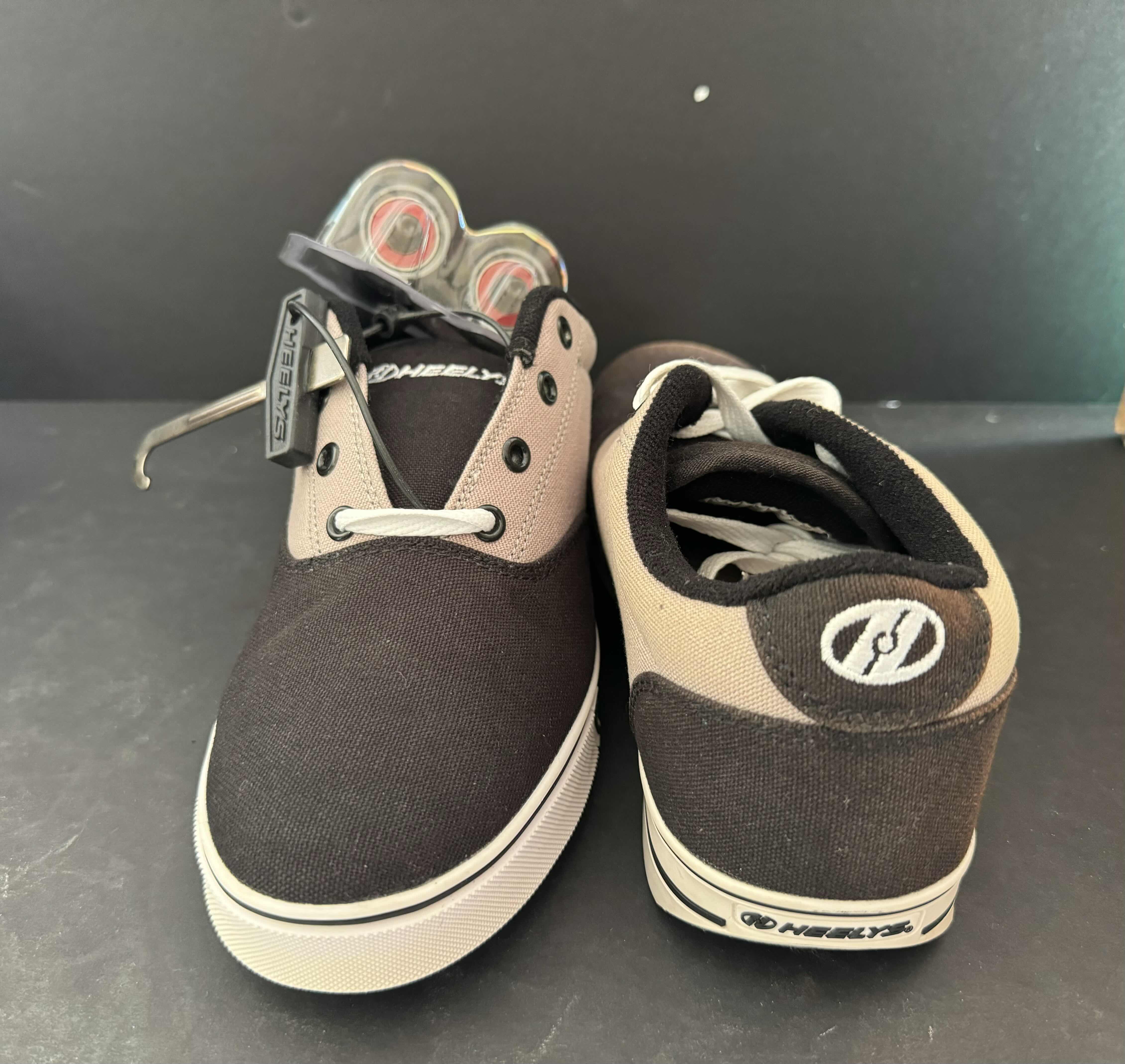 Photo 1 of BRAND NEW HEELYS SIZE YOUTH 5