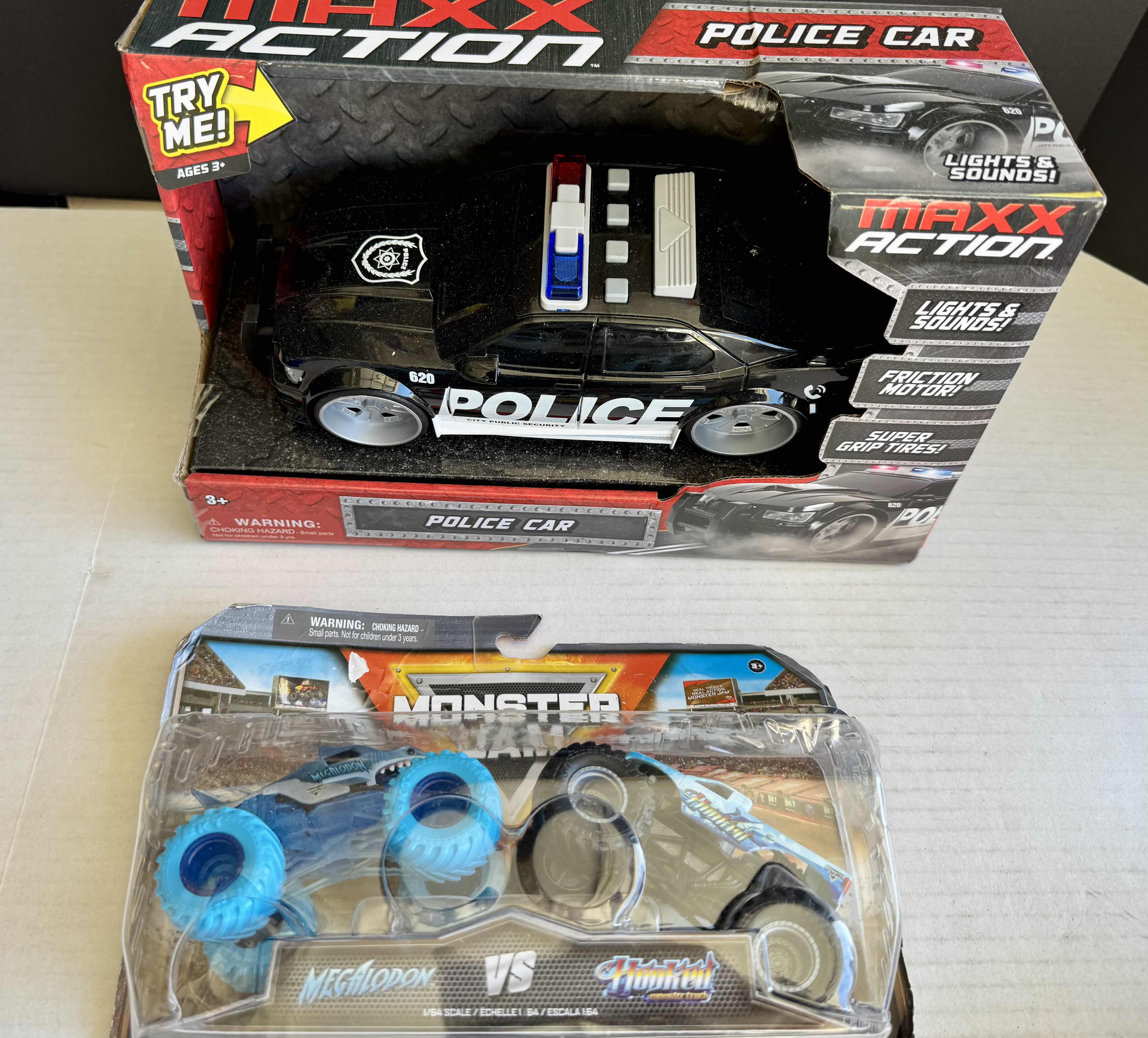 Photo 1 of 2 - BRAND NEW TOYS 1-MONSTER JAM & 1-MAXX ACTION POLICE CAR