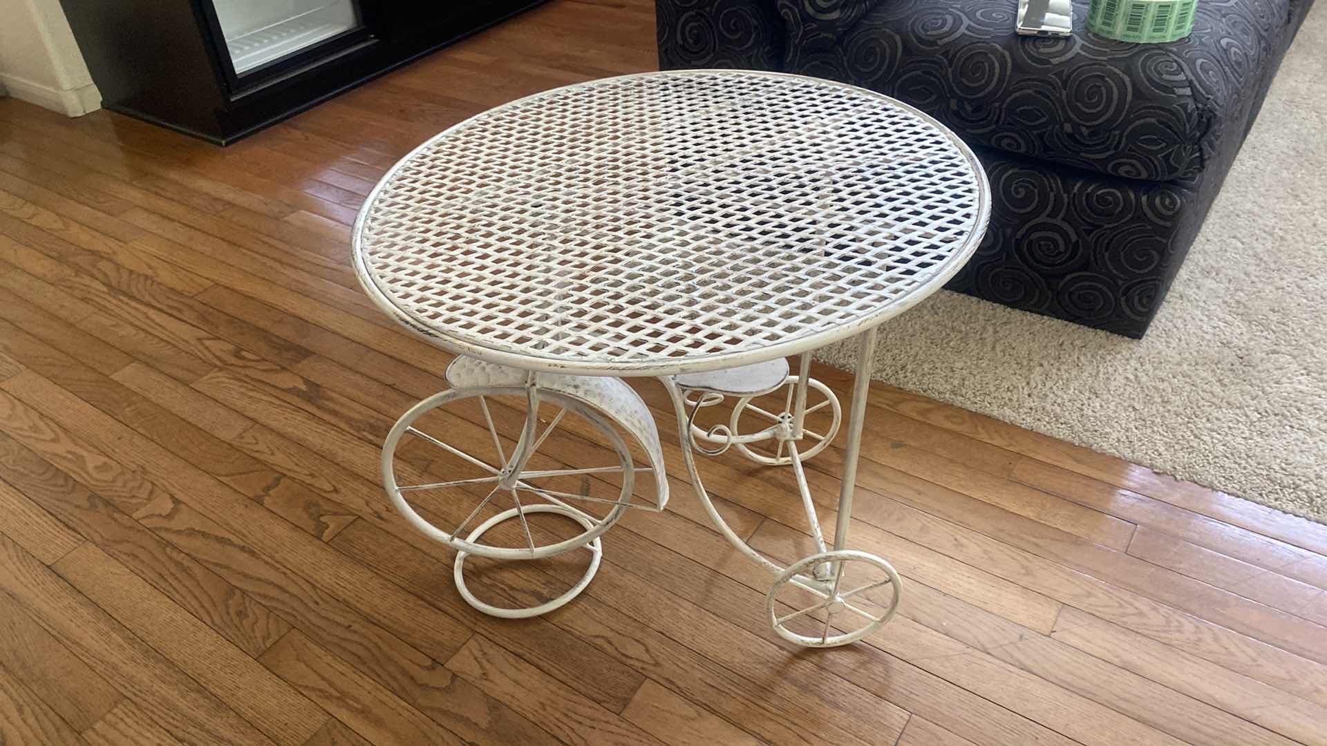 Photo 2 of ALUMINUM BICYCLE TABLE 24” x 21”