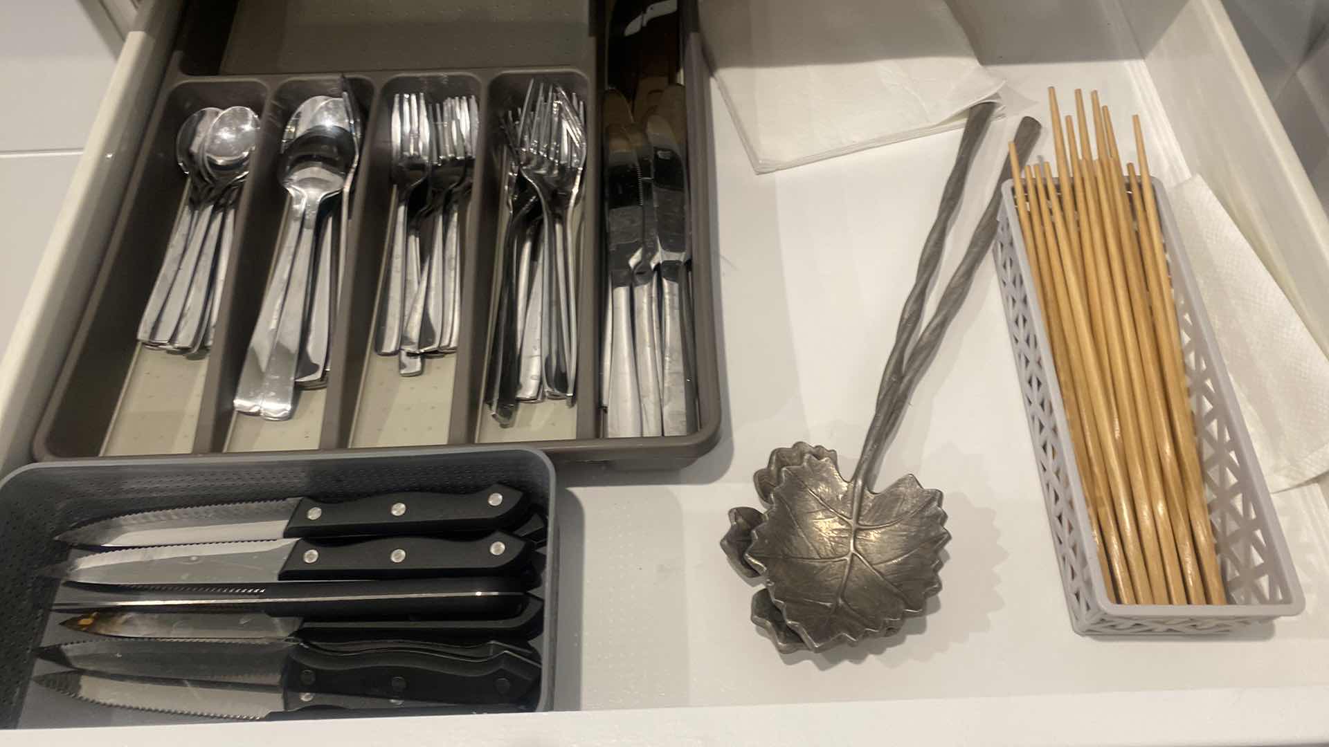 Photo 1 of CONTENTS OF KITCHEN CABINET SILVERWARE