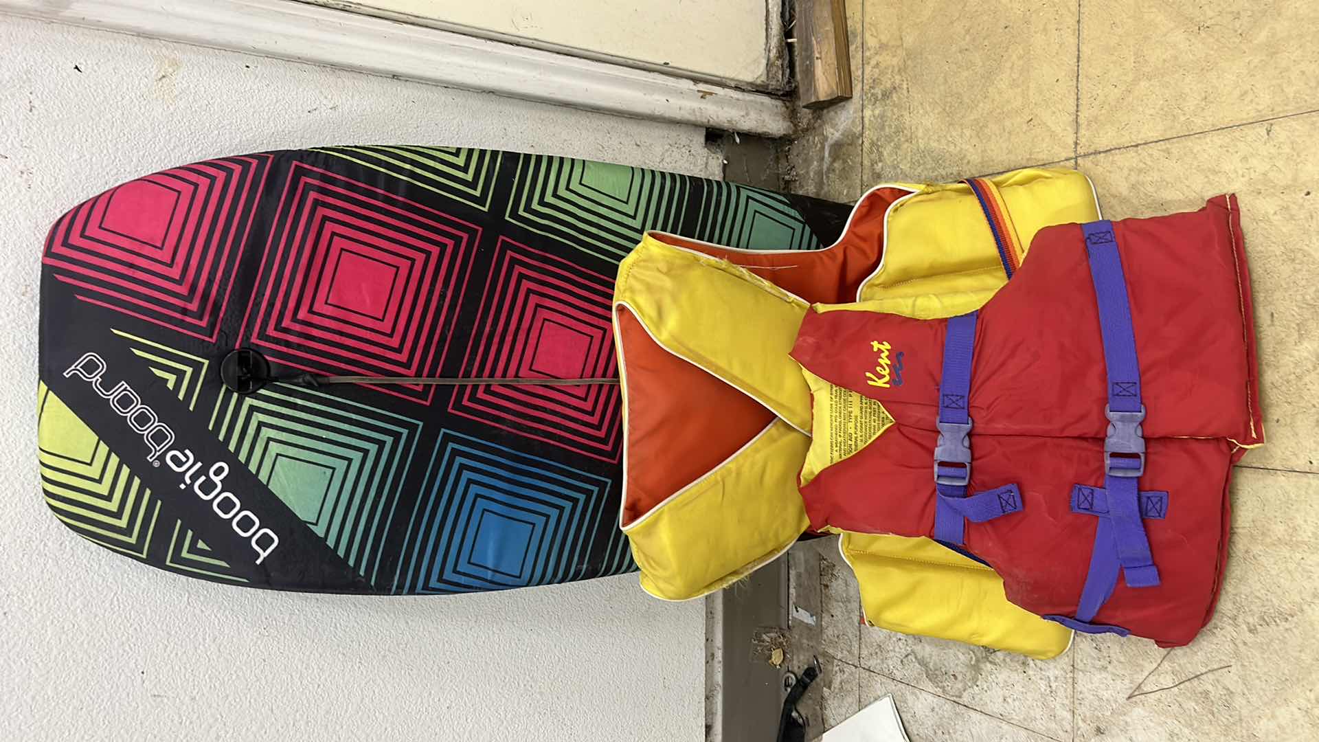 Photo 1 of BOOGIE BOARD AND 2 LIFE VESTS