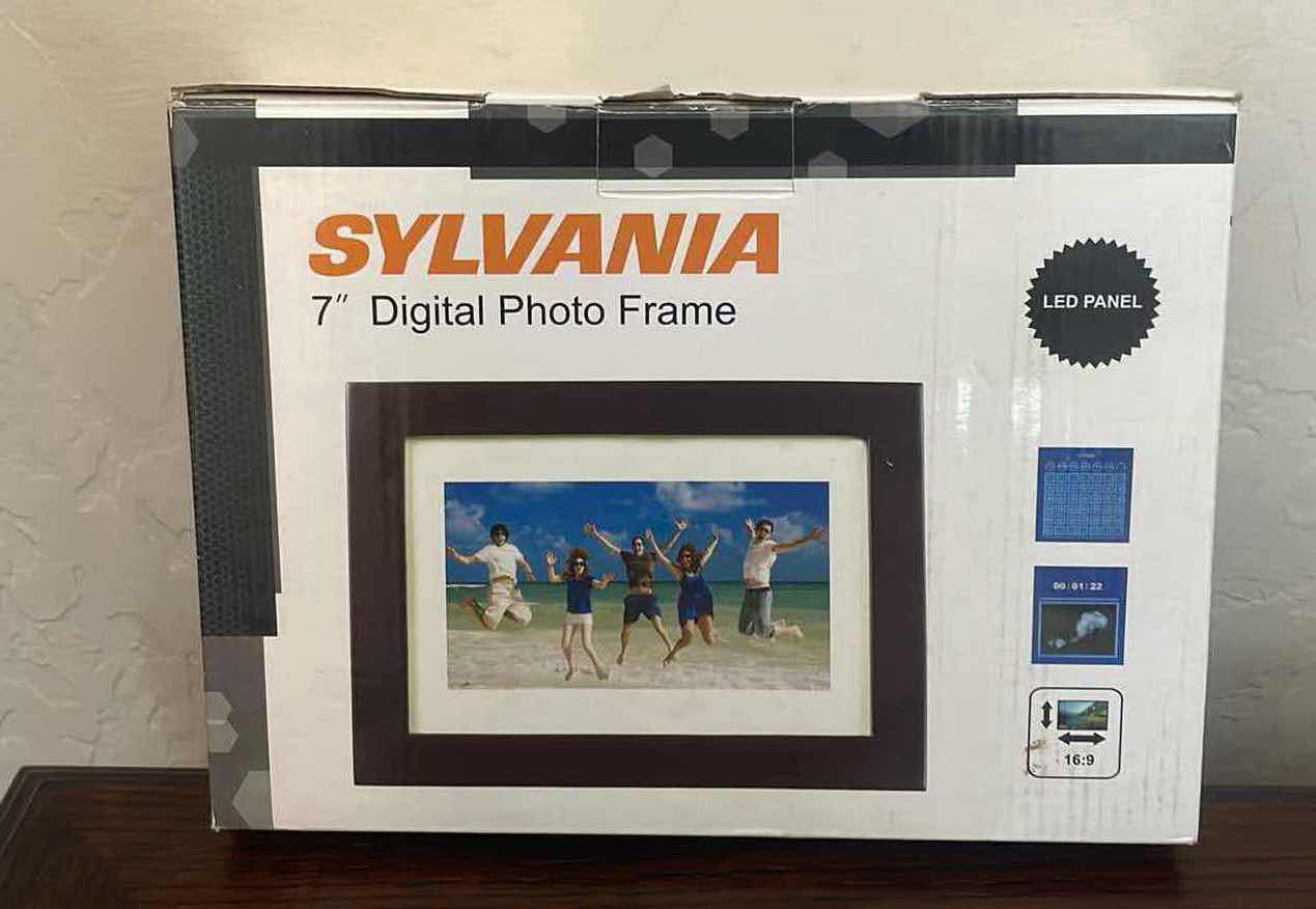 Photo 1 of SYLVANIA 7” DIGITAL PICTURE FRAME