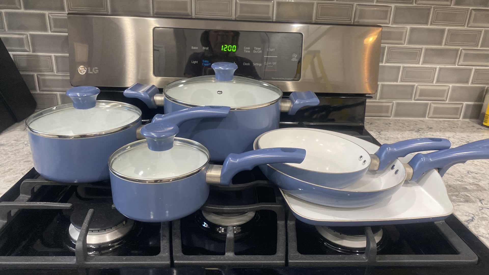 Photo 3 of CONTENTS KITCHEN CABINET - 9 PIECE T-FAL POTS & PANS