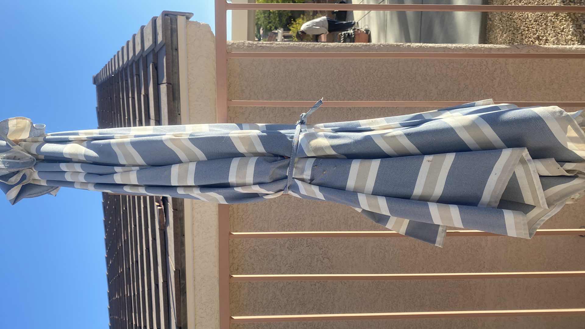 Photo 2 of BLUE & TAN STRIPED PATIO UMBRELLA 8’