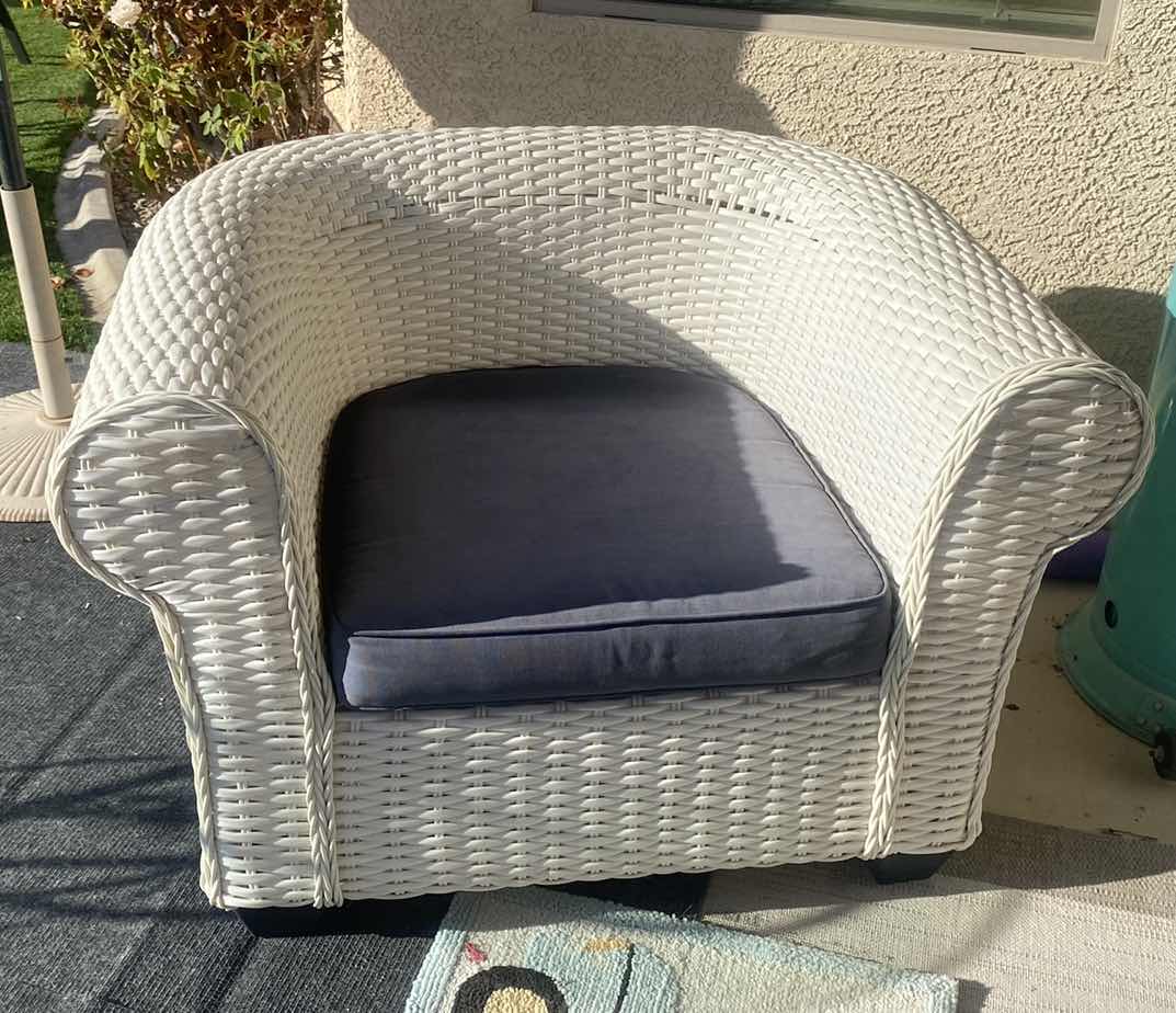 Photo 1 of PLASTIC WICKER PATIO CHAIR WITH FADED BLACK CUSHION 42“ x 33“ H 29” (2 available each sold separately)