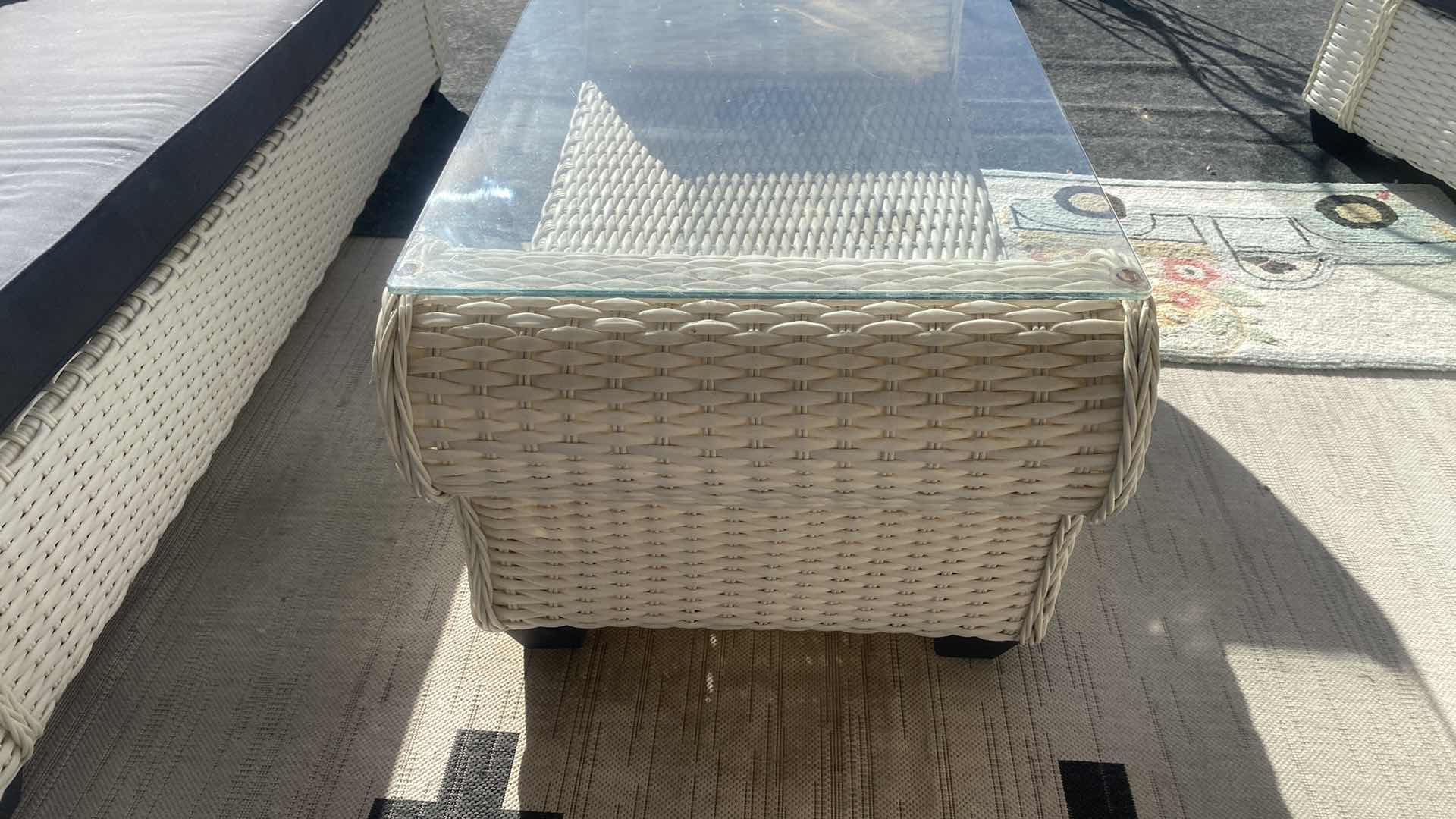 Photo 3 of PLASTIC WICKER PATIO TABLE WITH GLASS TOP 52“ x 25“ H 21”