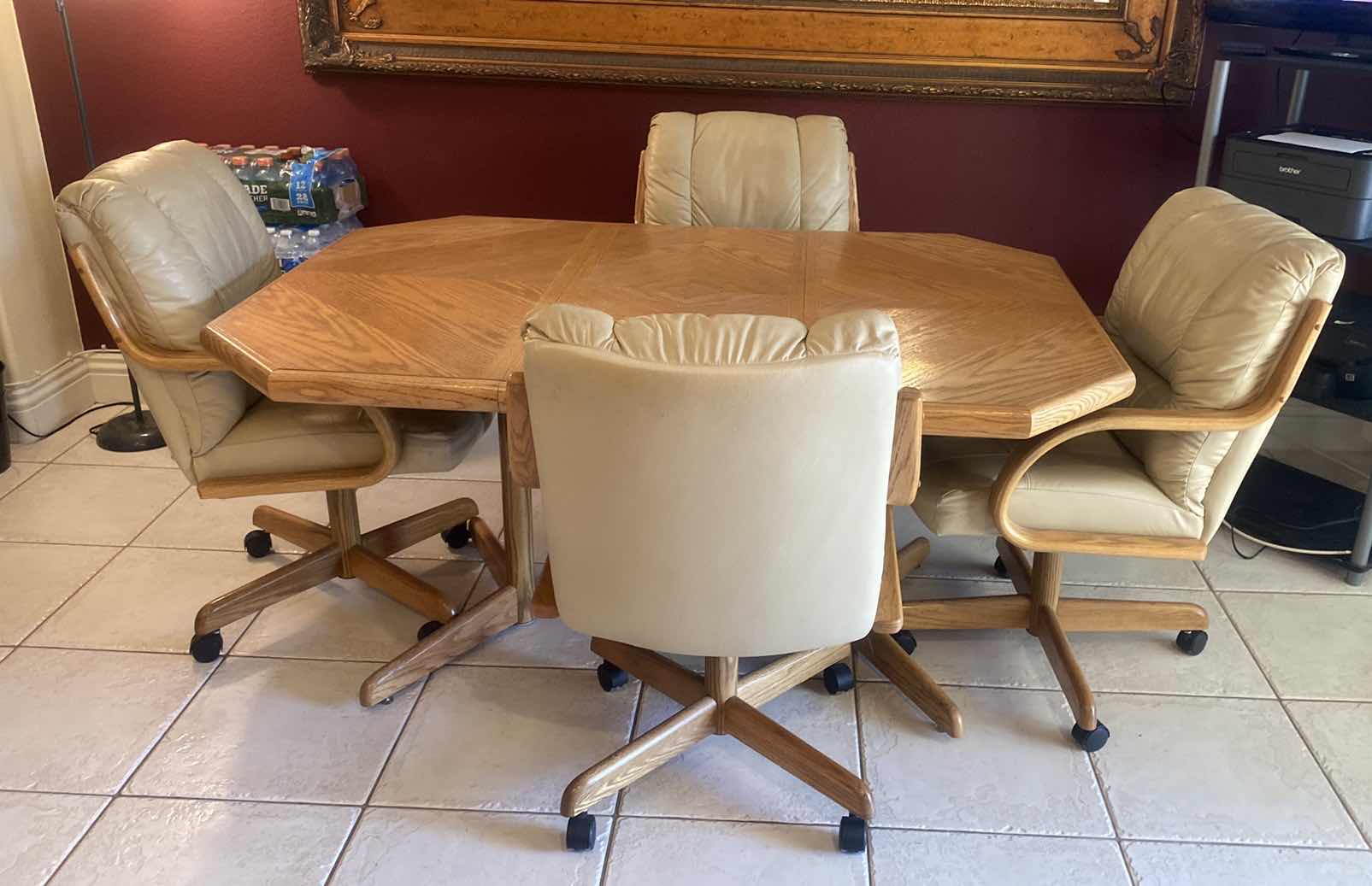 Photo 1 of OAK KITCHEN TABLE WITHOUT LEAF 41 1/2” x 41 1/2” H 30” LEAF 17 1/2” WITH 4 BEIGE LEATHER CHAIRS WITH WHEELS