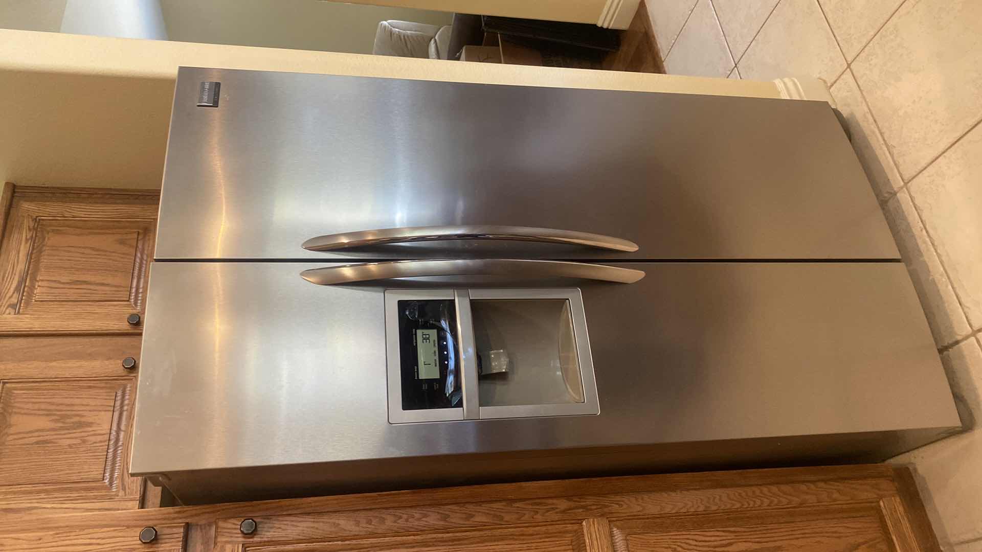 Photo 2 of FRIGIDAIRE GALLERY STAINLESS STEEL REFRIGERATOR WITH ICE MAKER 35” x 33” H 69 7/8”