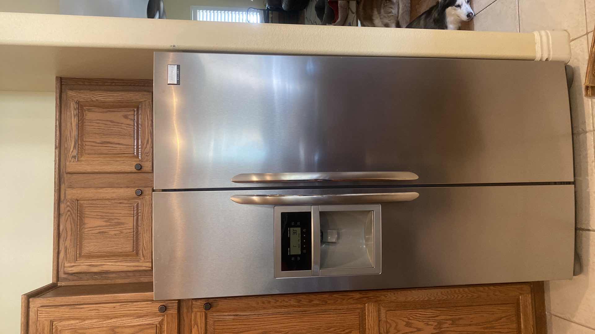 Photo 1 of FRIGIDAIRE GALLERY STAINLESS STEEL REFRIGERATOR WITH ICE MAKER 35” x 33” H 69 7/8”