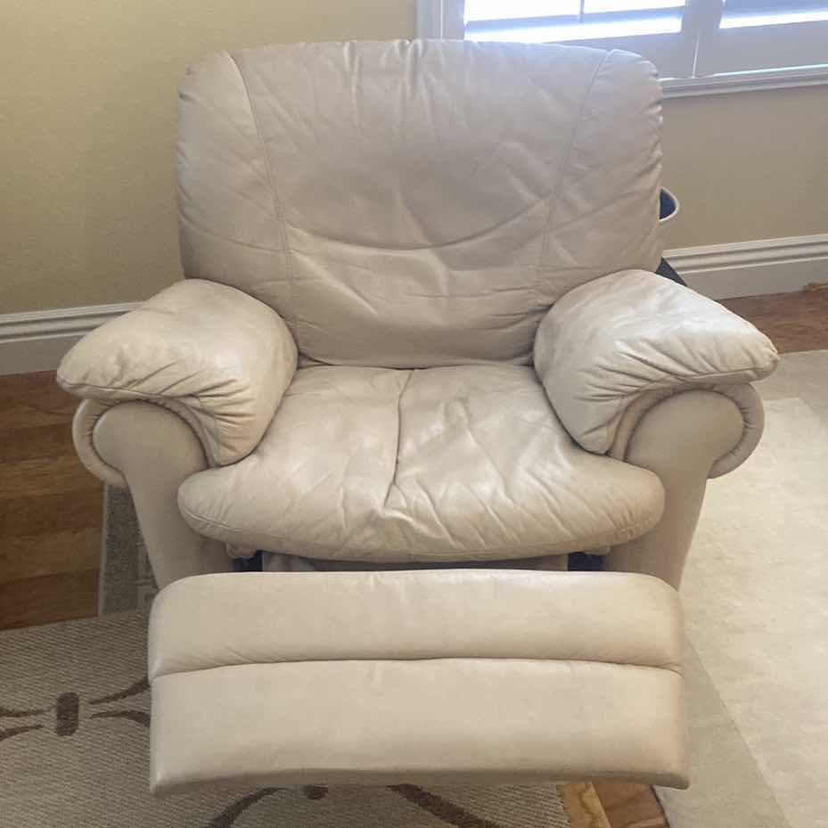 Photo 1 of BEIGE SWIVEL MANUAL LEATHER RECLINER 42“ x 36“ H 34”