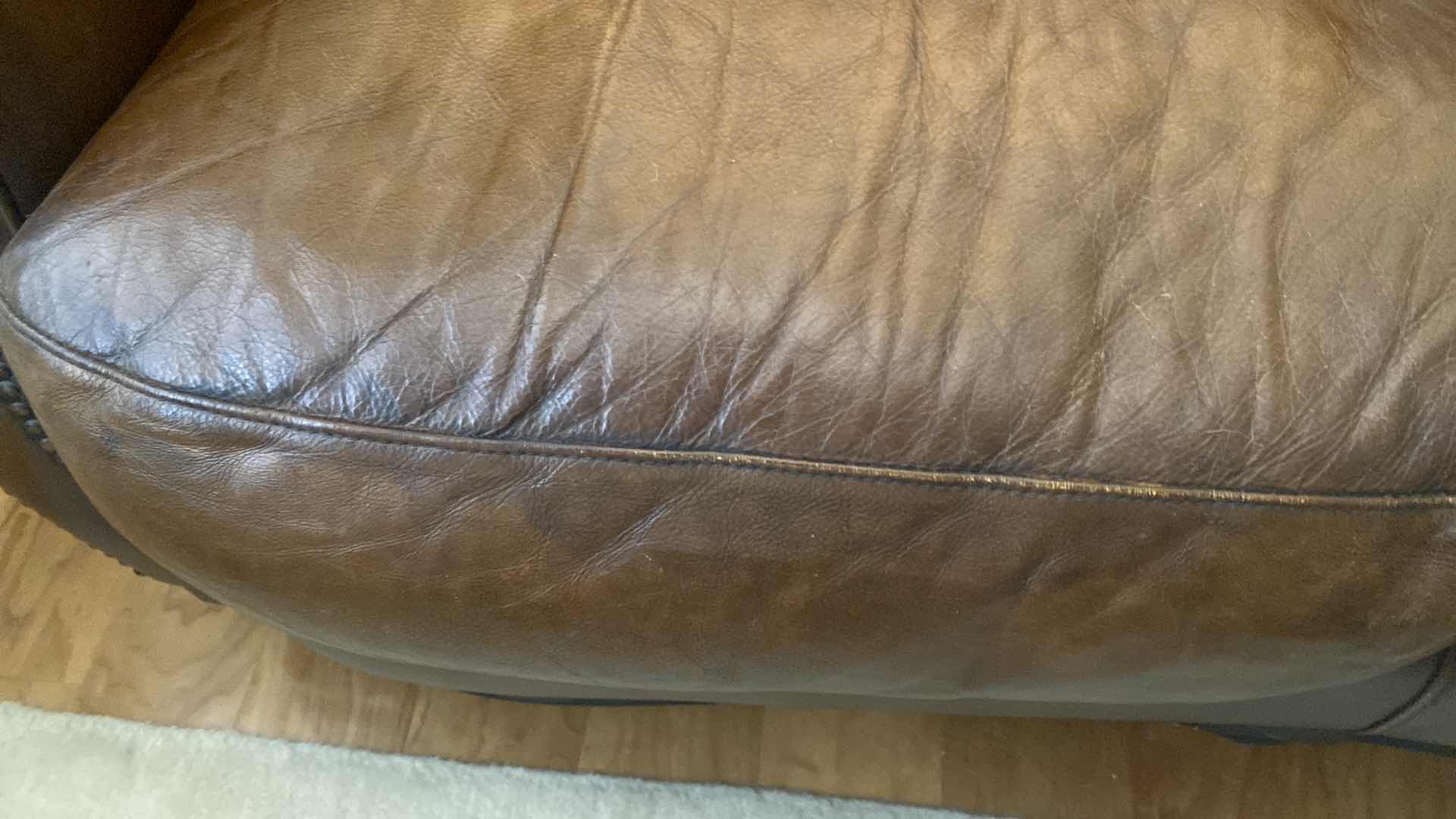 Photo 5 of 67” LEATHER MART BROWN WITH ROLLED ARMS & NAILHEAD TRIM LOVESEAT