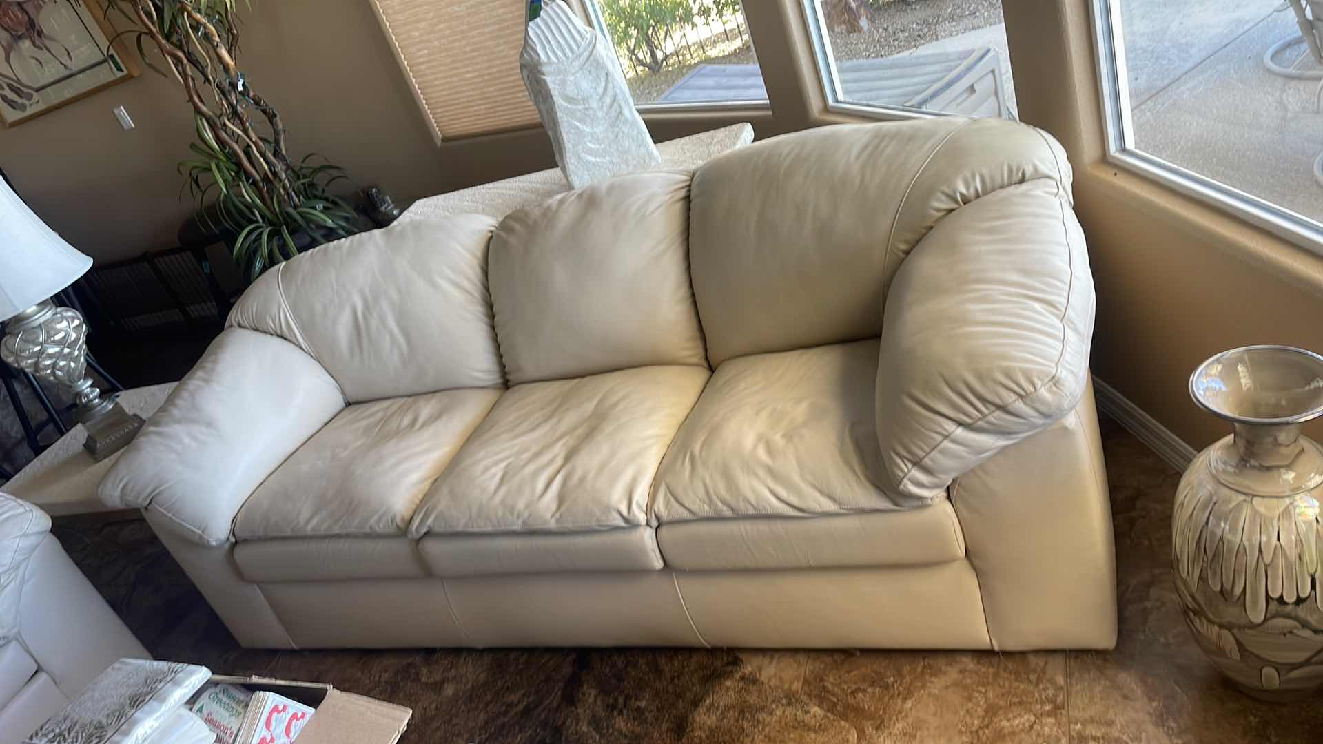 Photo 2 of 89"OFF WHITE LEATHER SOFA 
H34”