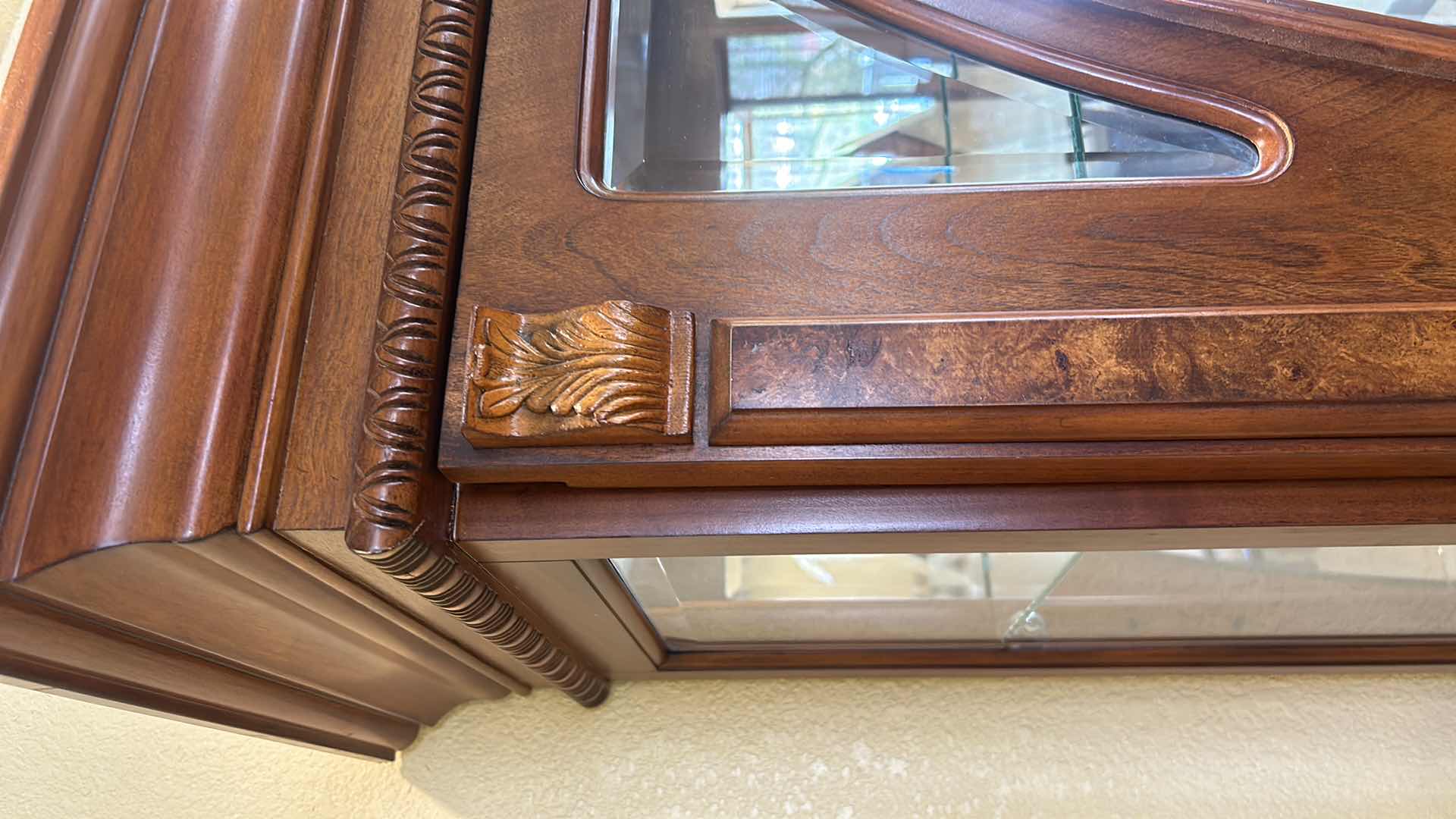 Photo 2 of LIGHTED WOOD CABINET WITH BEVELED GLASS, SLIDING DOOR, AND THREE GLASS SHELVES. 33“ x 15 1/2“ x H77“.